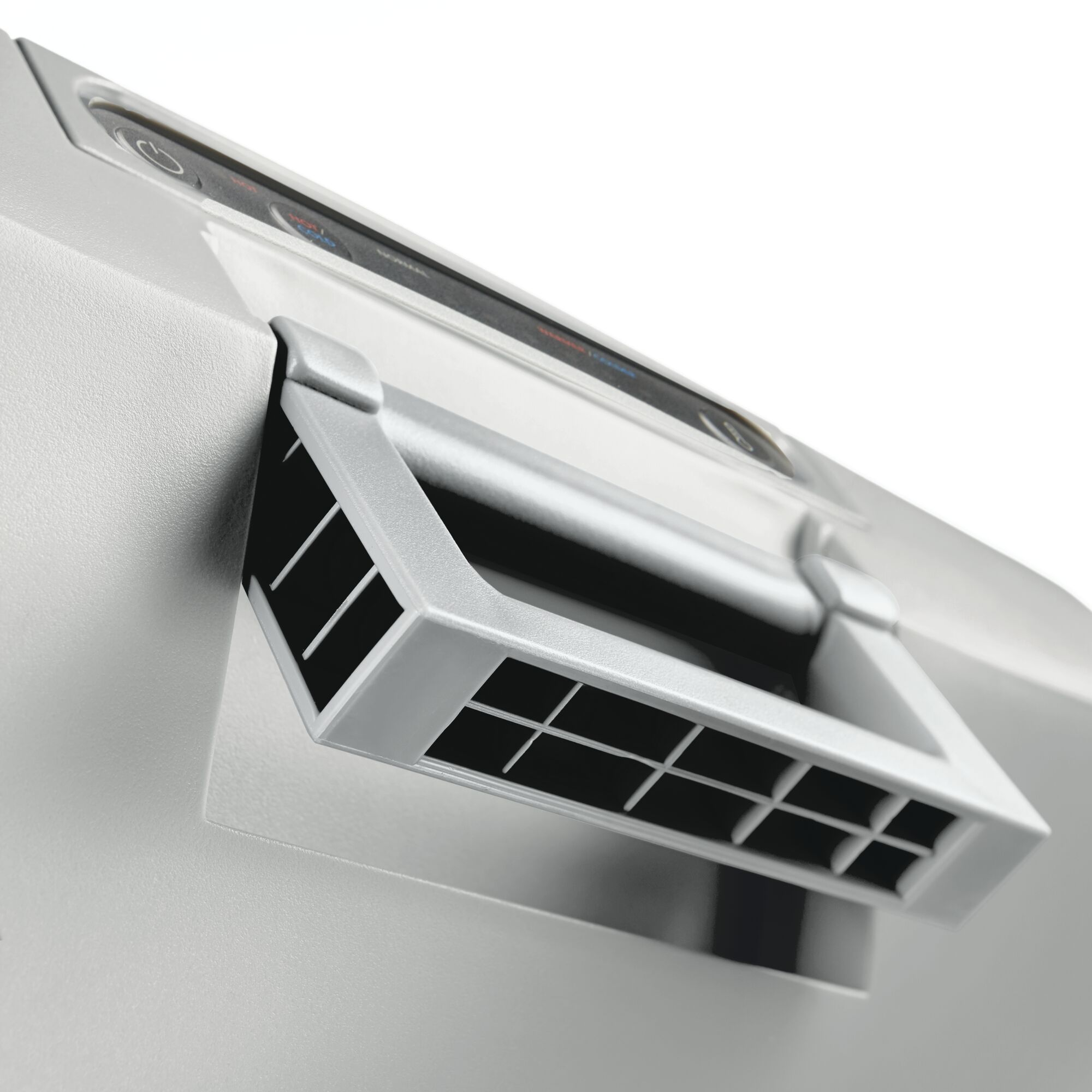 Zbliżenie białej i szarej suszarki do rąk z uchwytem i otworami wentylacyjnymi.