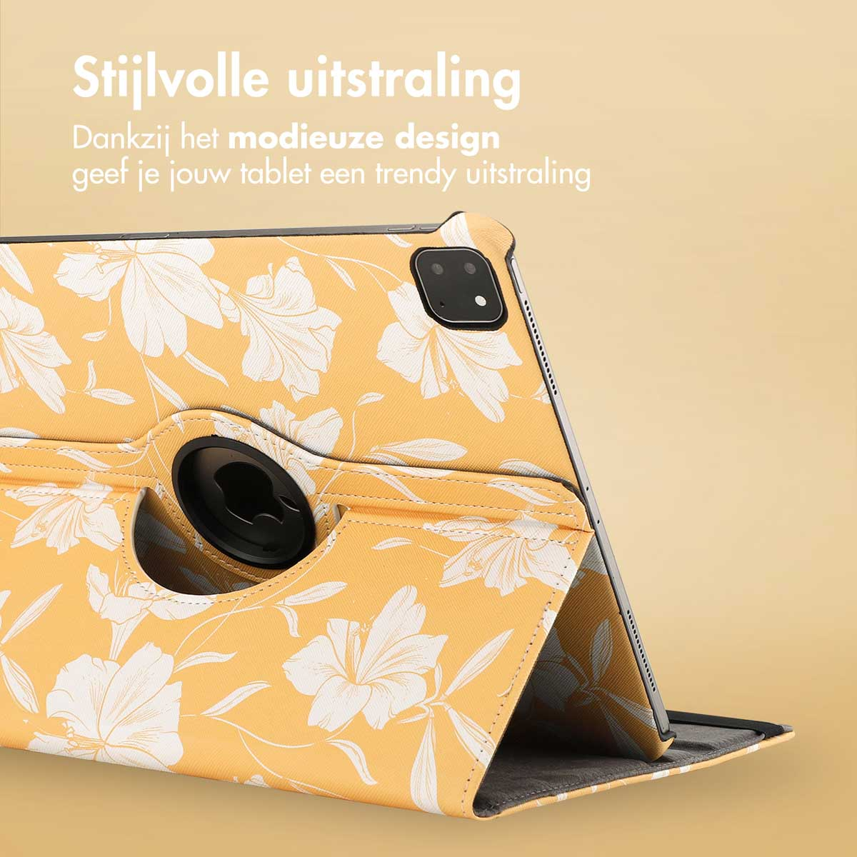 Tablet case in yellow with a floral design. The tablet is propped up, and the case shows a rotating part.