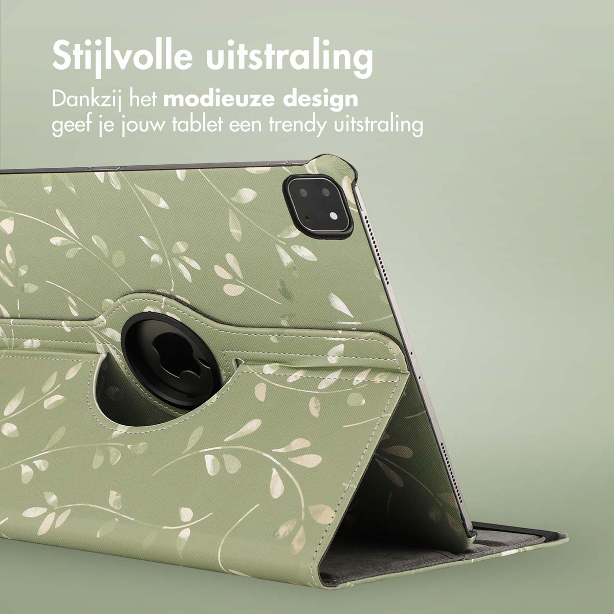 Tablet in a green case with a floral design and a rotating stand.