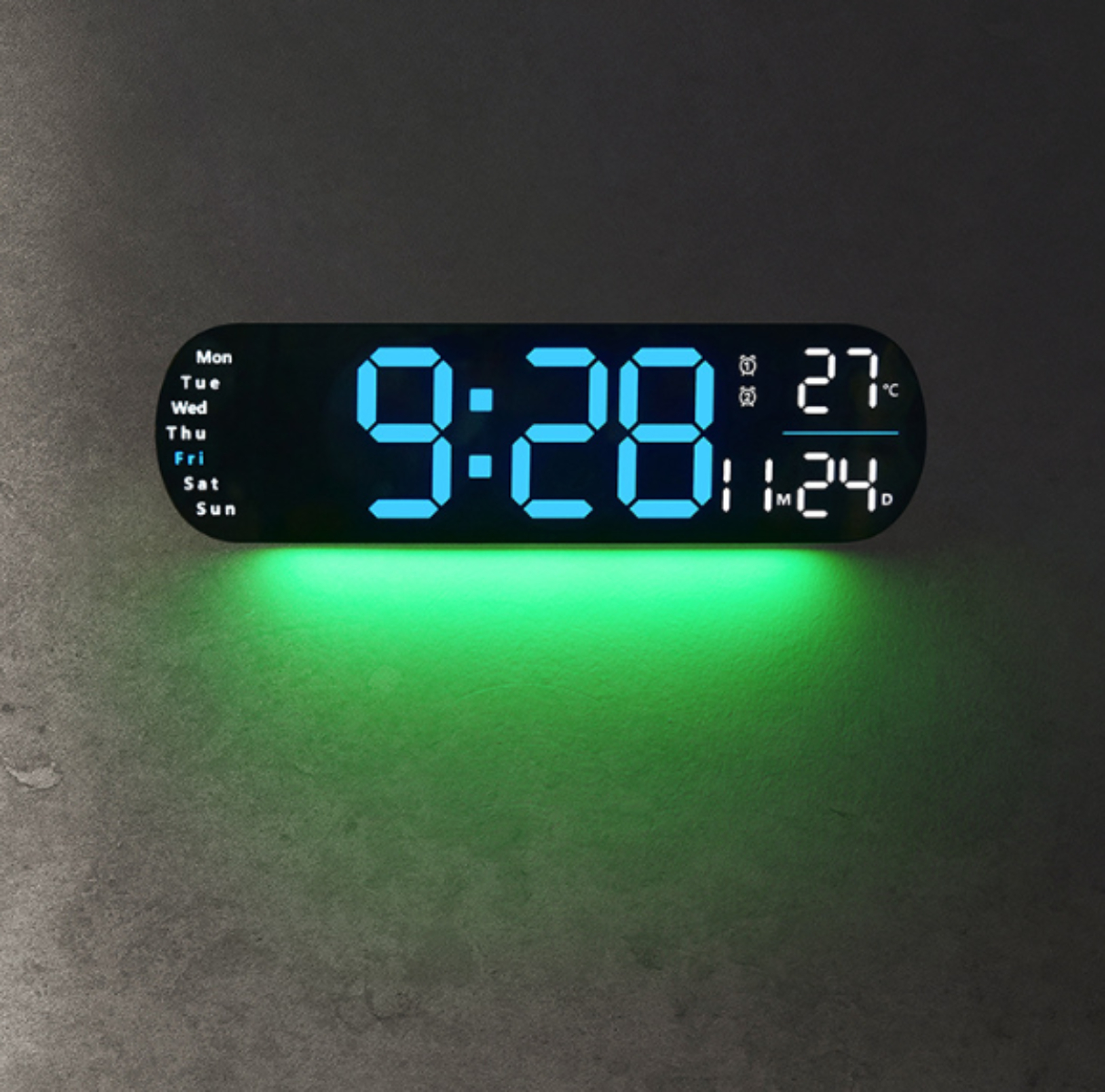 Digitaluhr, die 9:28 und 11:24 anzeigt. Zeigt den Tag und das Datum mit grünem Licht.