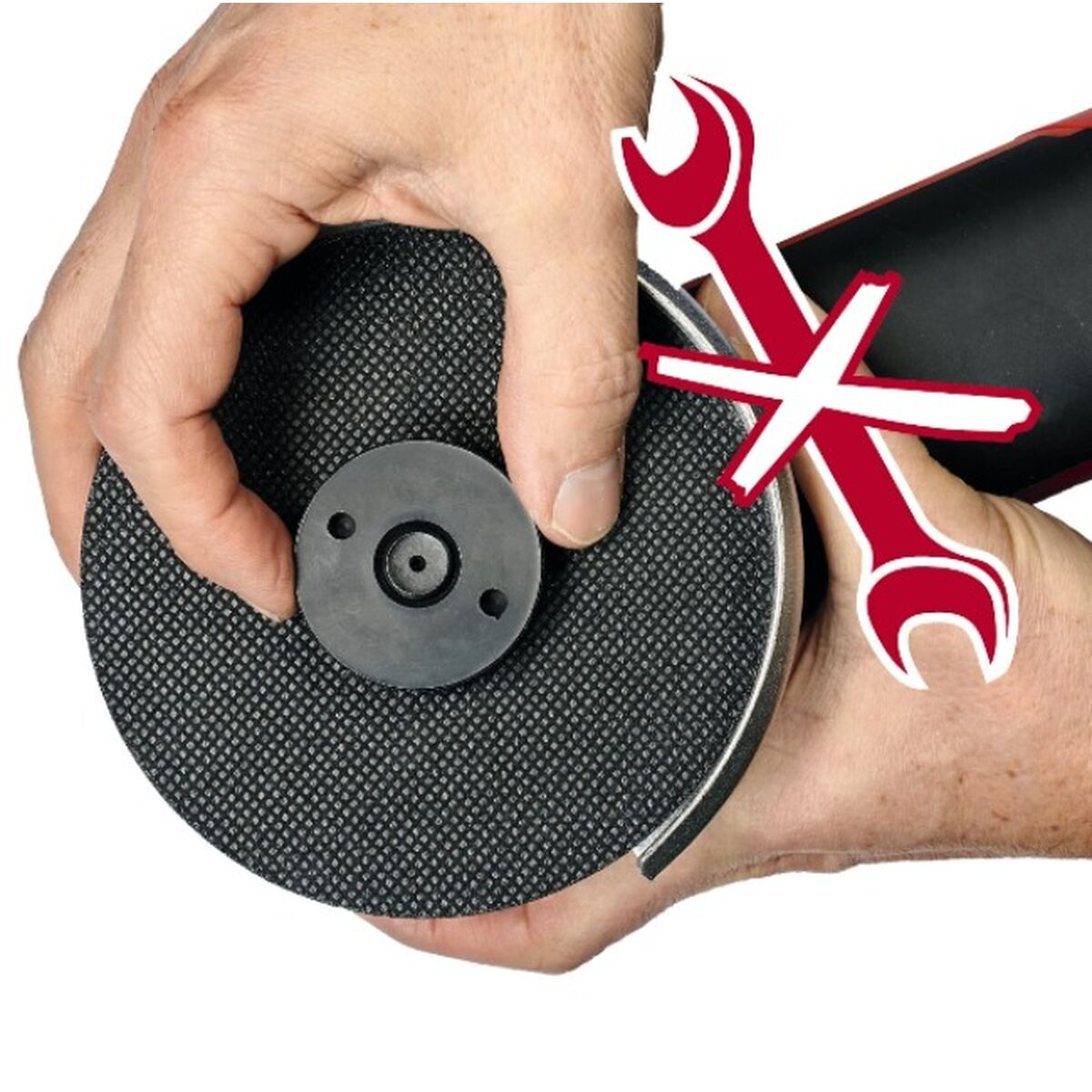 Dłonie trzymające tarczę szlifierską z ikoną klucza.