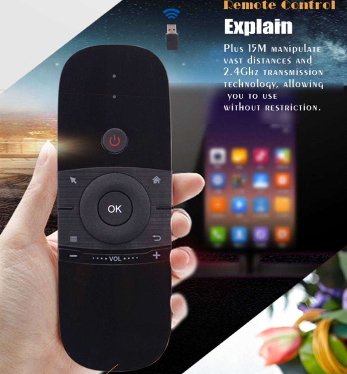 Eine Hand hält eine schwarze Fernbedienung. Tasten und ein USB-Empfänger sind sichtbar.