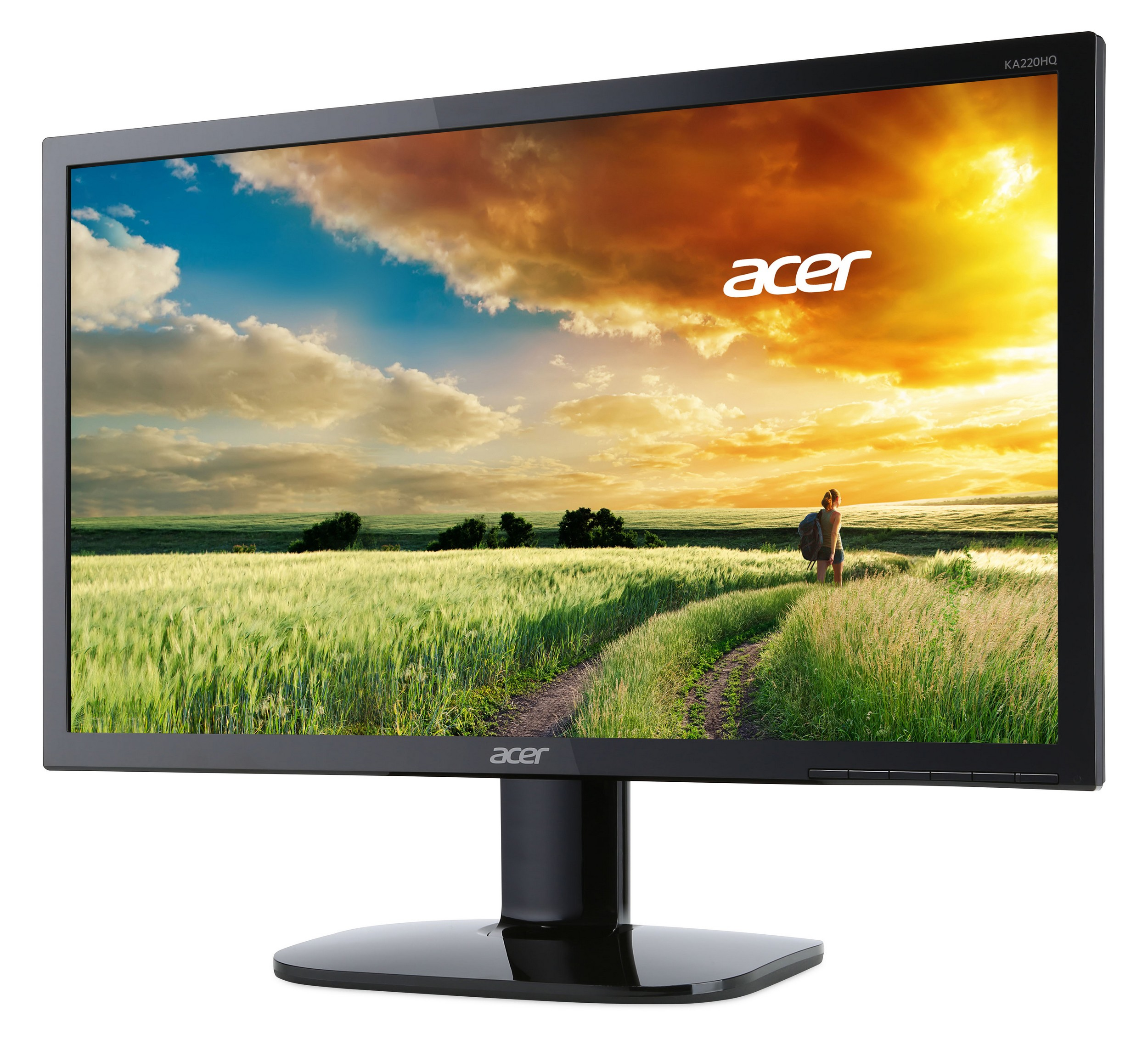 Monitor Acer che mostra un tramonto su un campo. Una persona cammina su un sentiero.