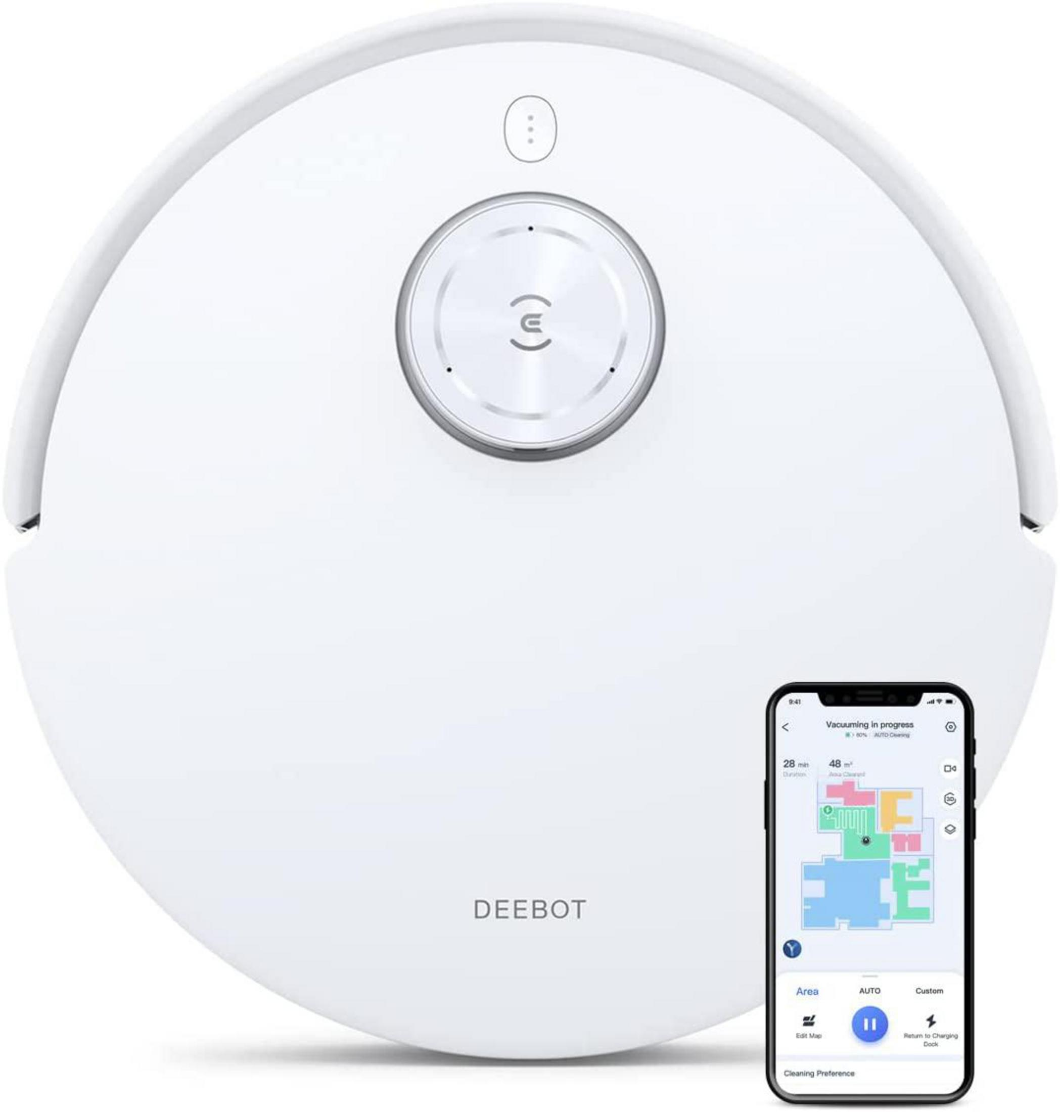 Biały odkurzacz automatyczny i smartfon wyświetlający mapę.