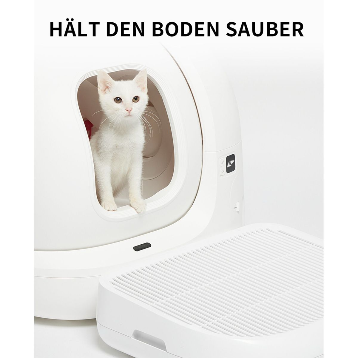 Weiße Katze in einer weißen, geschlossenen Katzentoilette. Die Box steht auf einer weißen Schale.