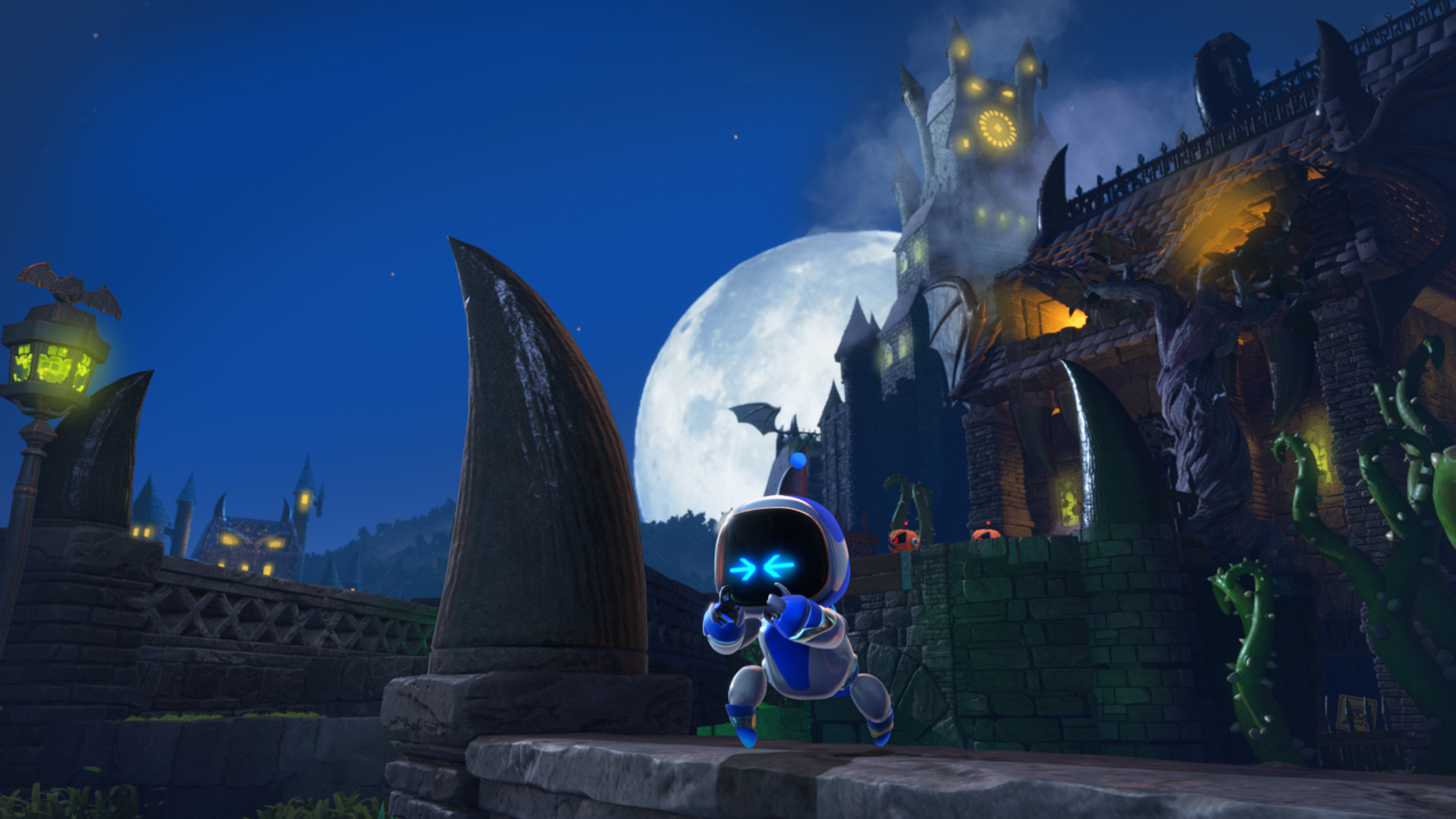 Astro Bot biegnie w stronę nawiedzonego domu w scenerii Halloween.