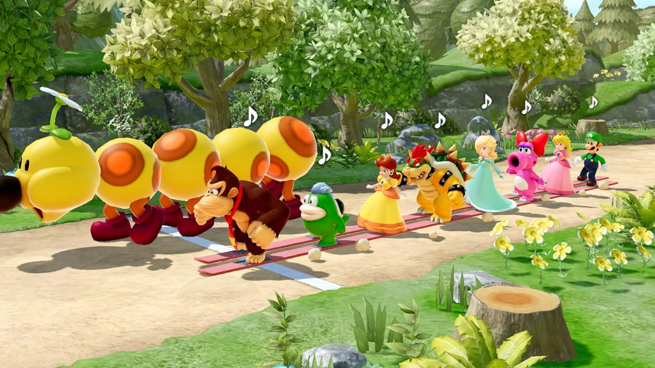 Scena z Mario Party z kilkoma postaciami idącymi po torze, otoczonymi naturą.