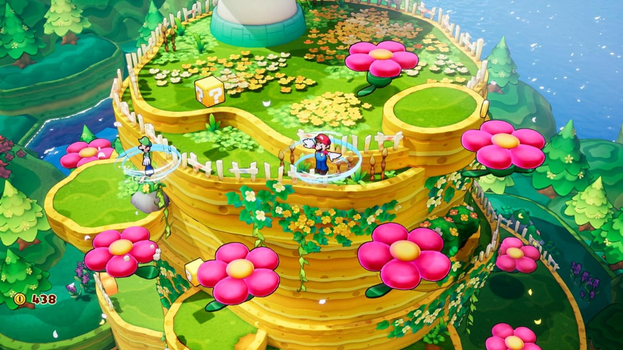 Mario i Luigi w kolorowym, warstwowym świecie pełnym kwiatów i bloku ze znakiem zapytania.