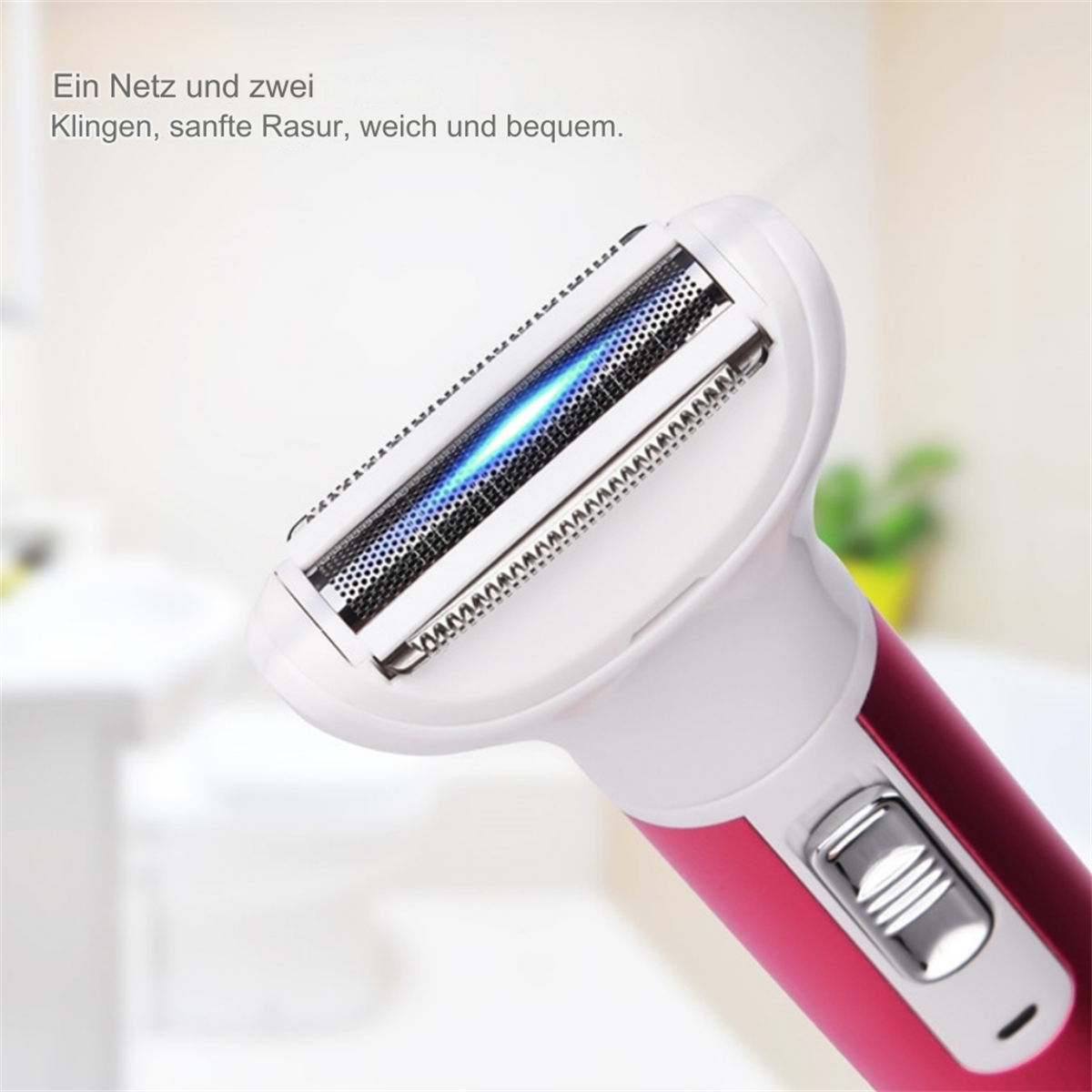 Nahaufnahme eines rosa-weißen Elektrorasierers. Klingen und Netz sichtbar.