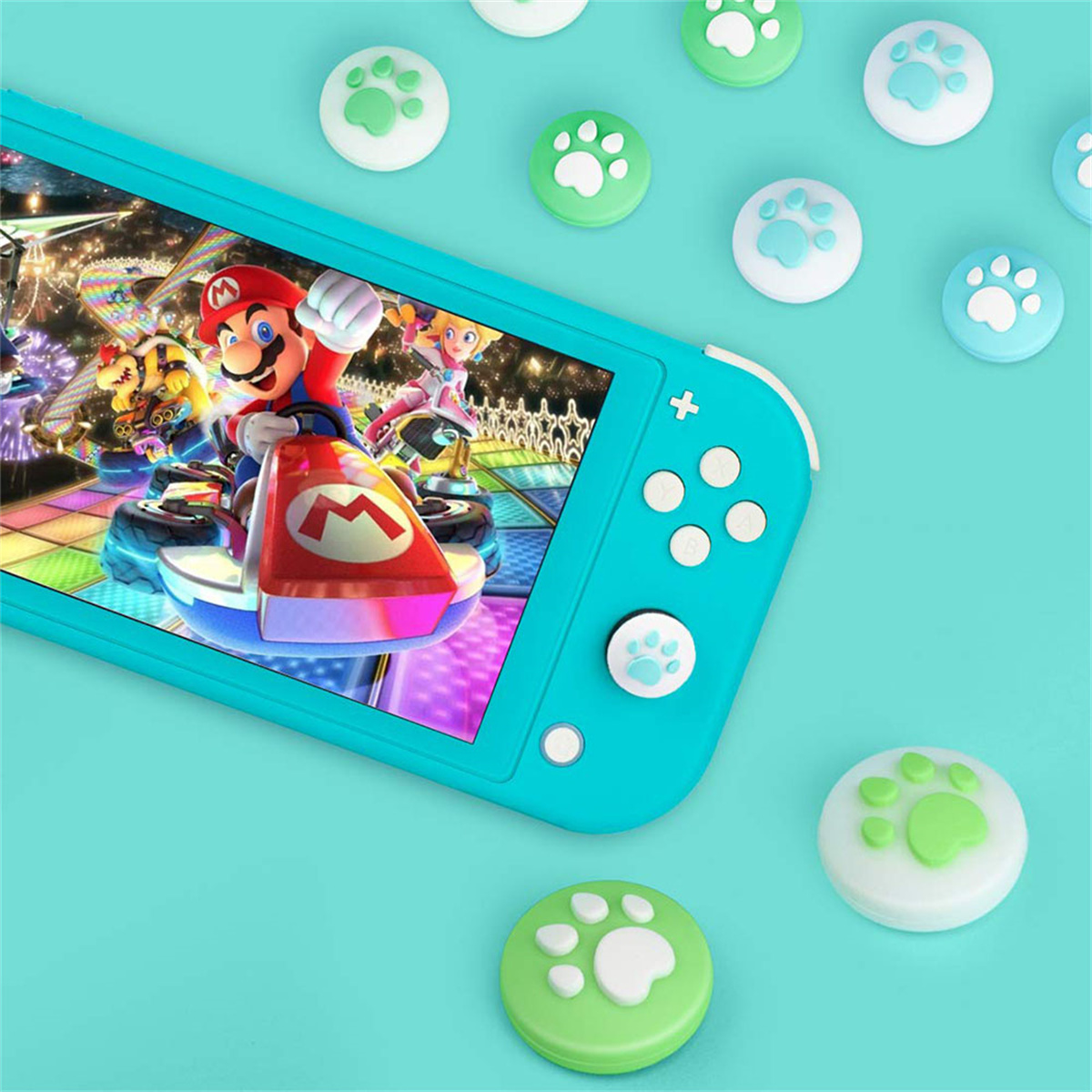 Ein Nintendo Switch mit Spielbildschirm und verstreuten pfotenförmigen Daumengriffen.