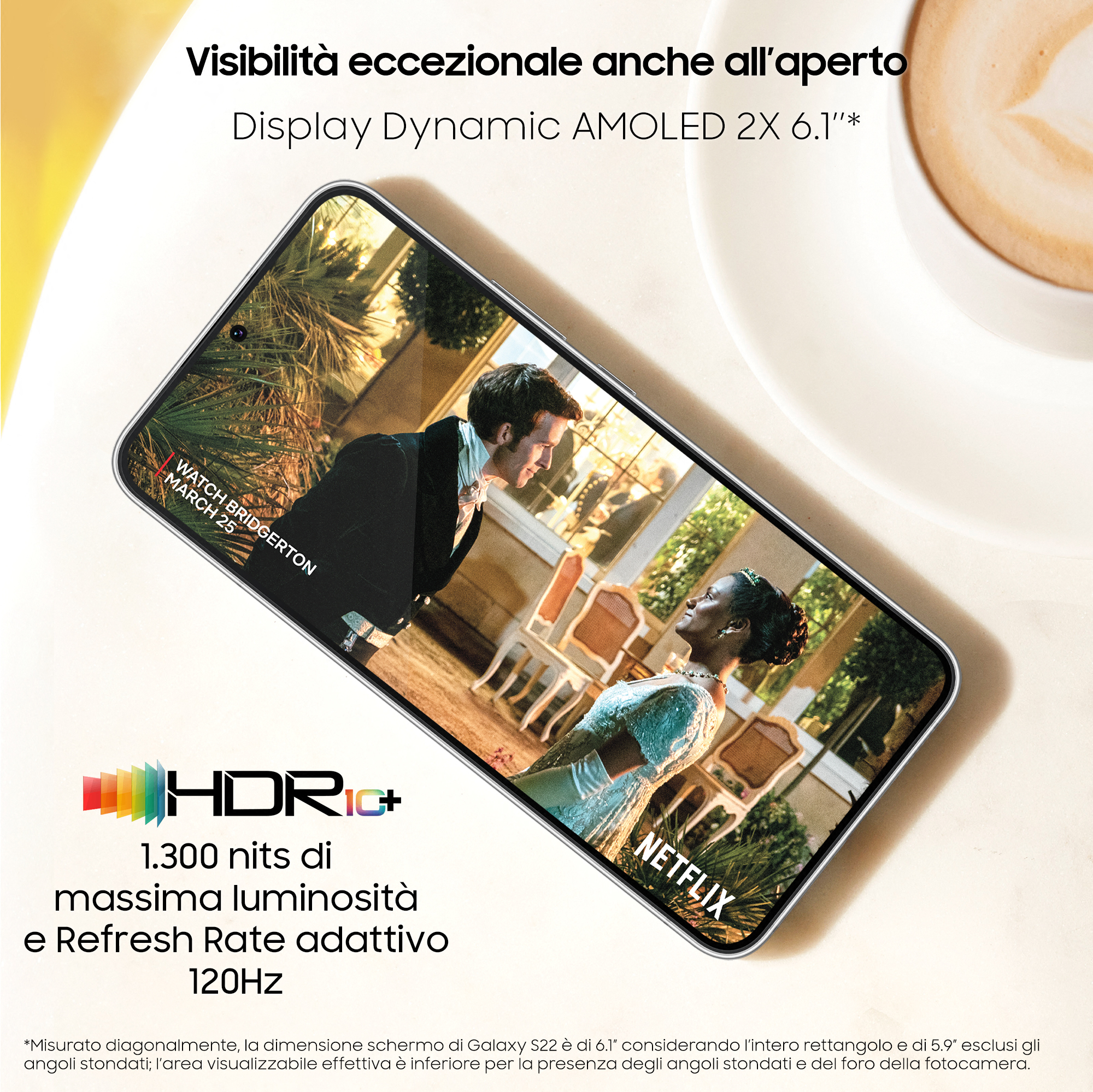 Un téléphone affichant une émission à l'écran. L'arrière-plan est une table avec une tasse de café.