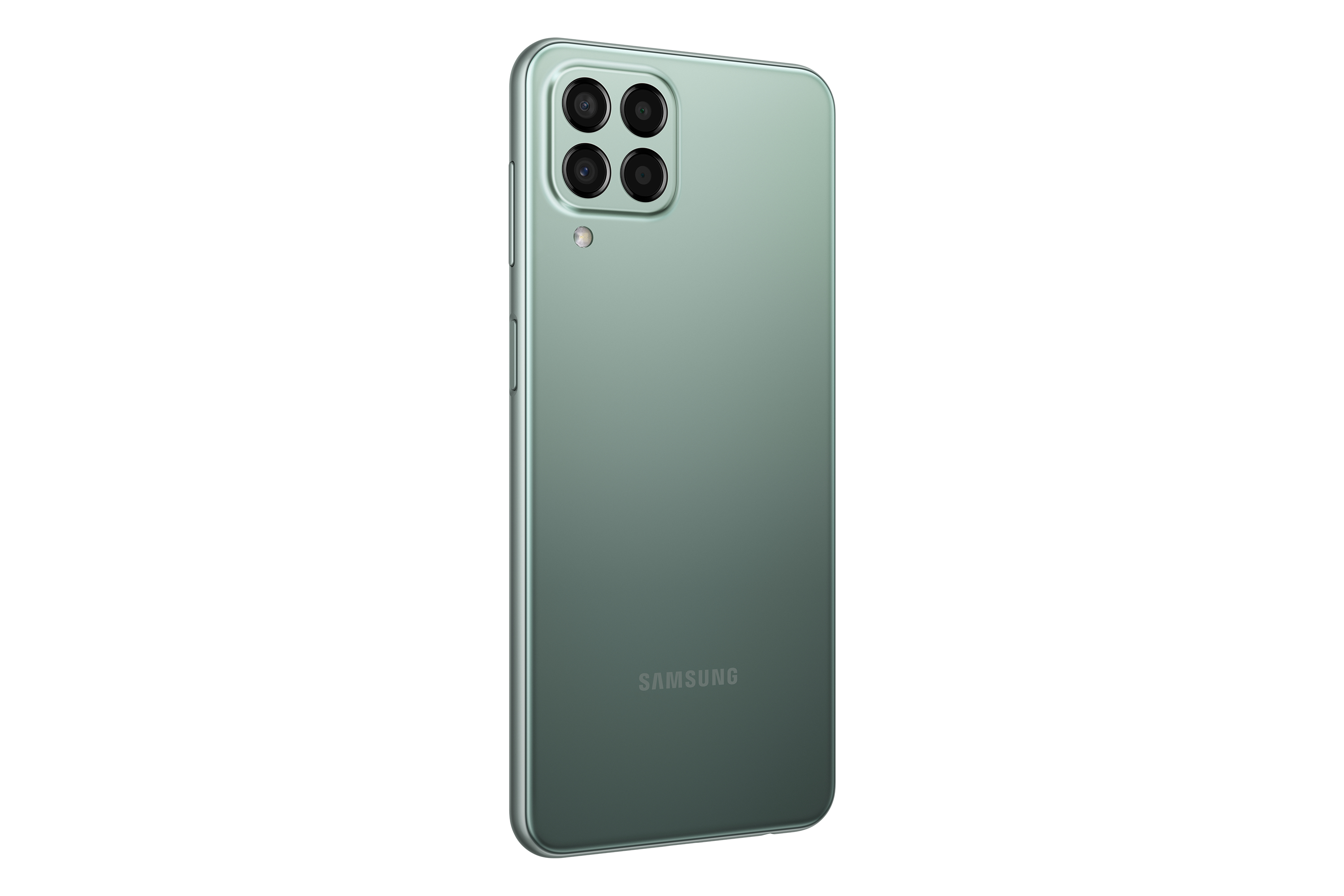 Teléfono verde, vista trasera. Cuatro cámaras visibles. Logotipo de Samsung presente. Fondo blanco.