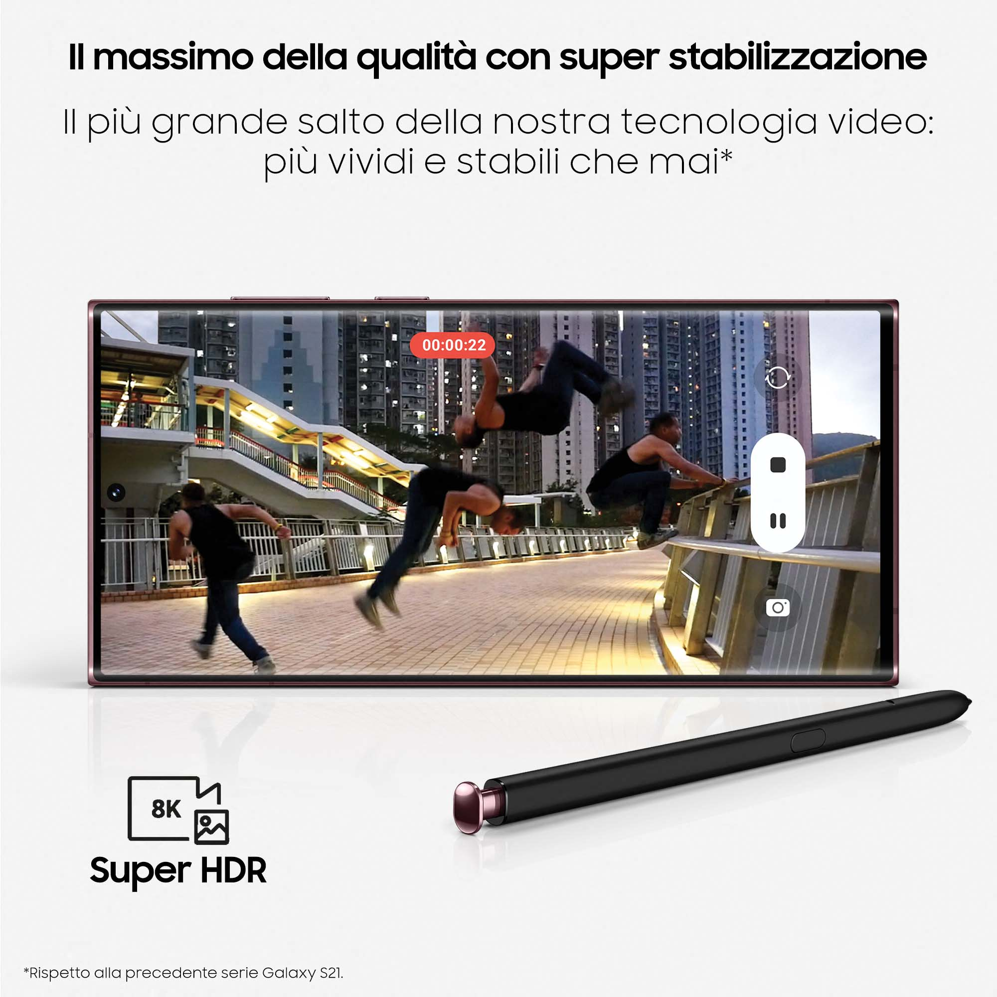 Ein Telefonbildschirm, der ein Video mit springenden Menschen zeigt. Ein Stift befindet sich unter dem Telefon.
