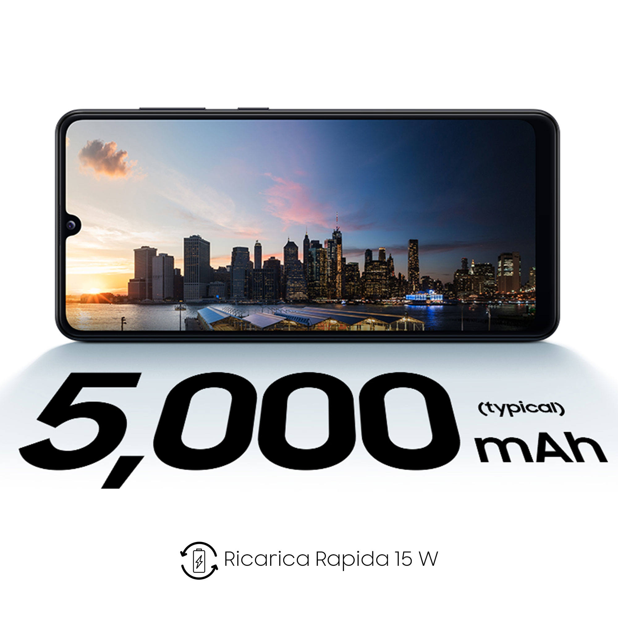 Ekran telefonu z panoramą miasta w nocy. Tekst informuje o baterii 5000 mAh i szybkim ładowaniu.