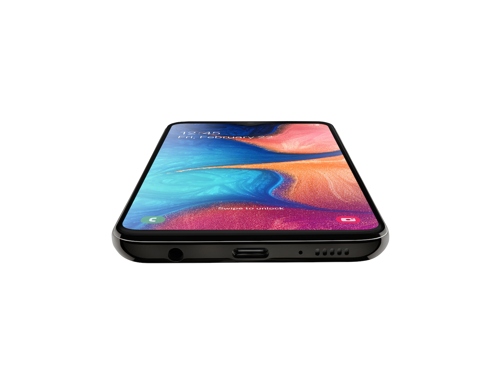 Czarny smartfon leży ekranem do góry, pokazując go. Ekran wyświetla kolorową, abstrakcyjną scenę.