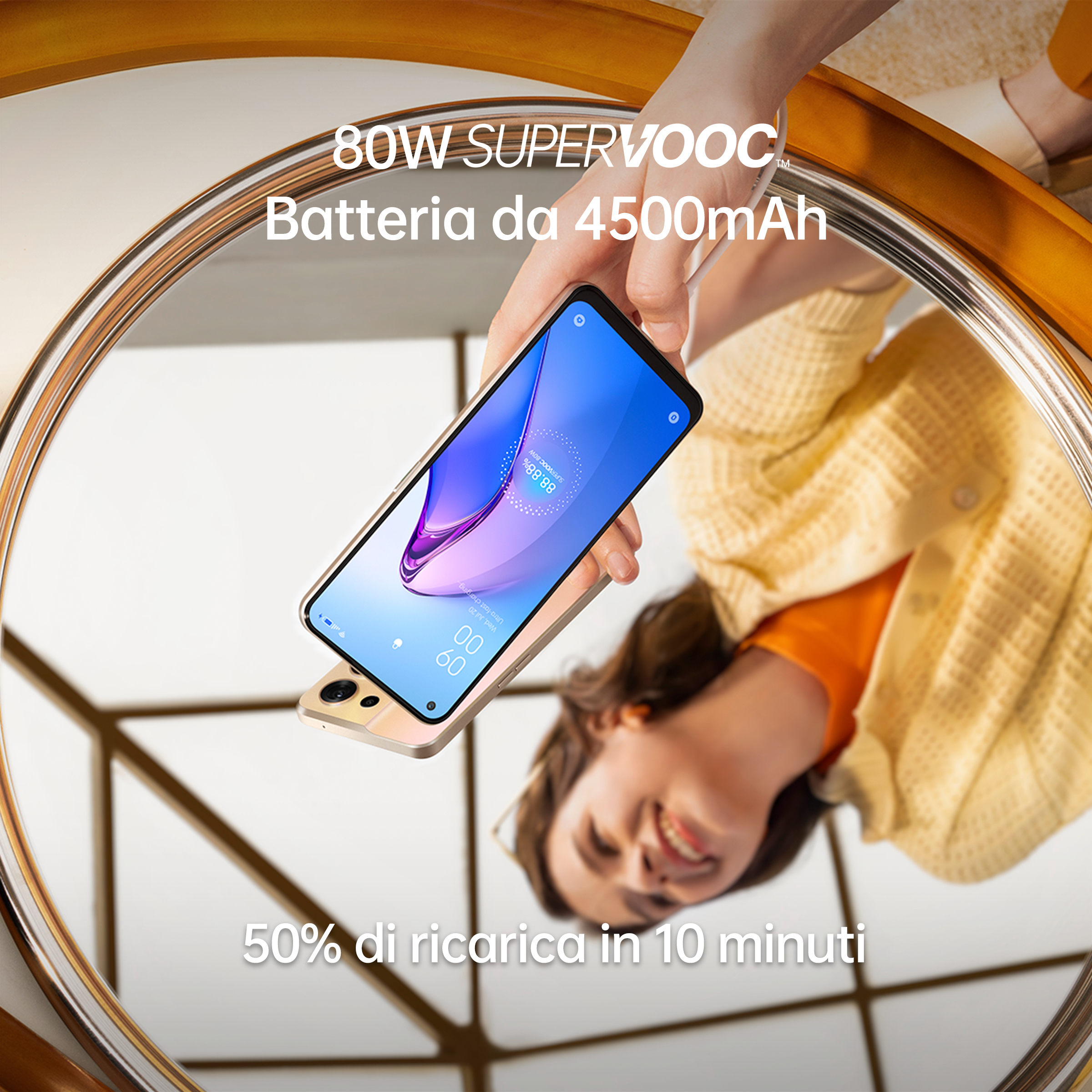 Telefon odbija się w lustrze. Tekst: 80W SuperVOOC, bateria 4500mAh, 50% w 10 min.