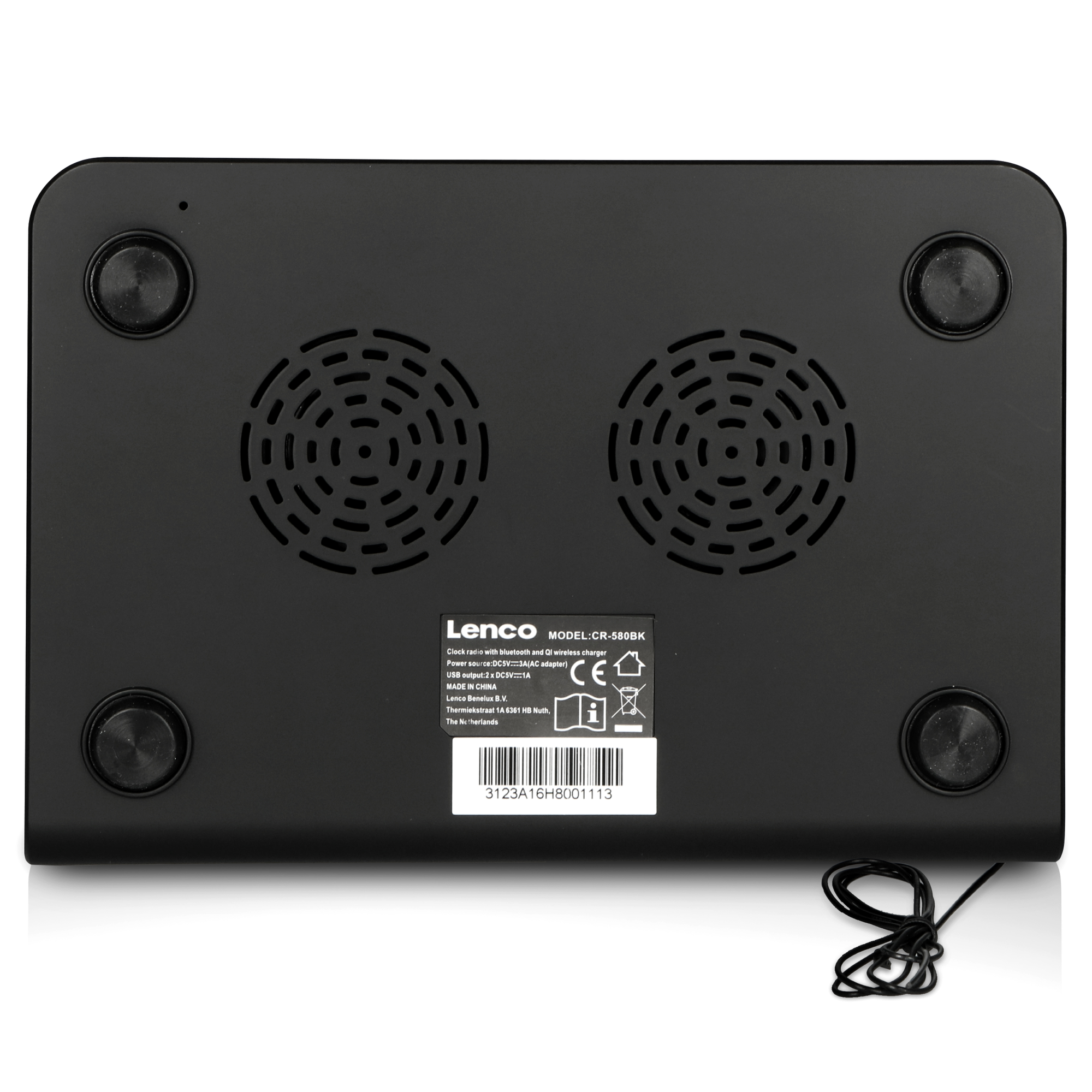 Black device's underside, with two fan grilles, a label, and four black rubber feet.