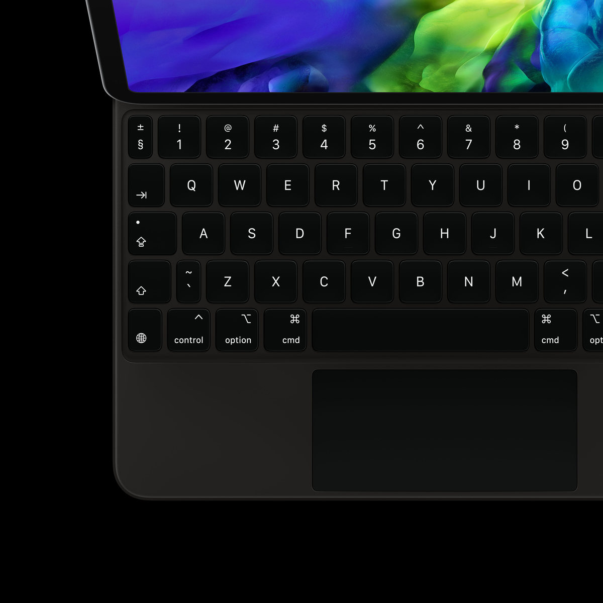 Nahaufnahme einer dunklen Tastatur mit einem bunten Hintergrundbild.