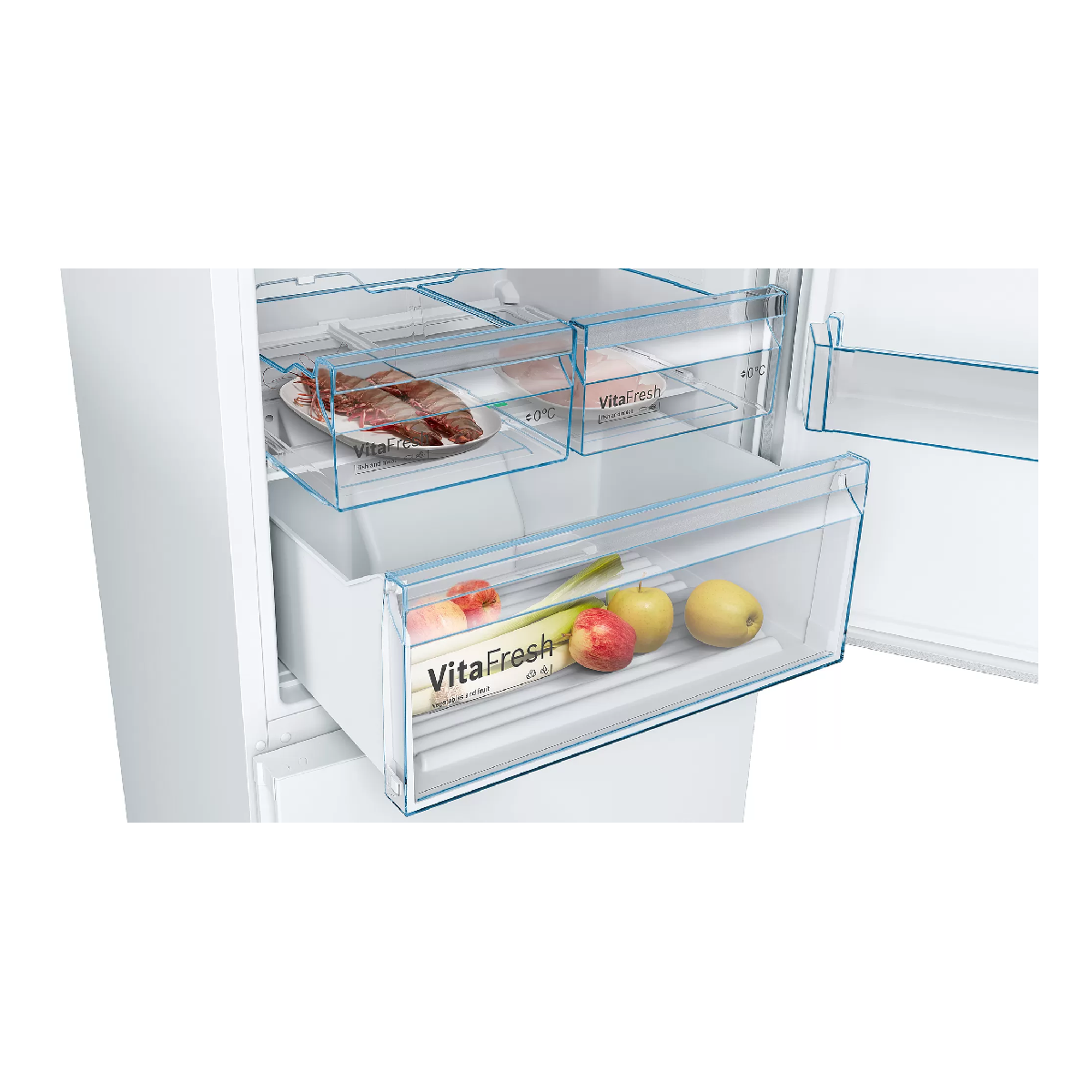 Interior de refrigerador con cajones transparentes con frutas, verduras y alimentos almacenados.