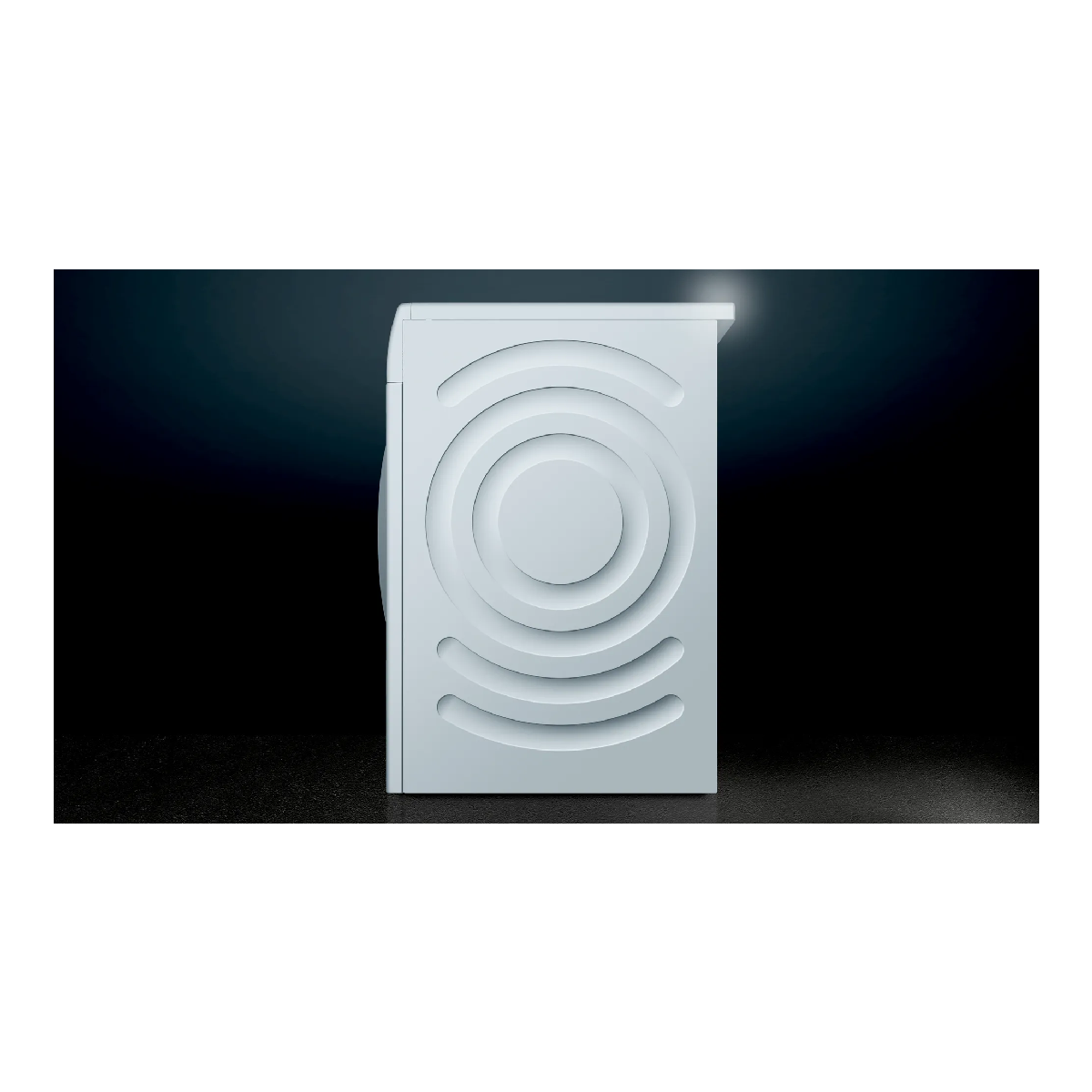 Una lavadora blanca con diseño circular en la parte delantera, sobre un fondo oscuro.
