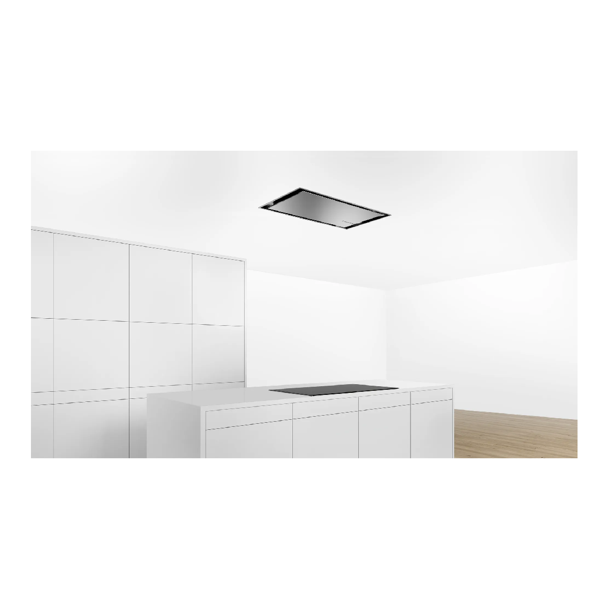 Cucina moderna con piano di lavoro bianco e piano cottura nero integrato. Cappa a soffitto.