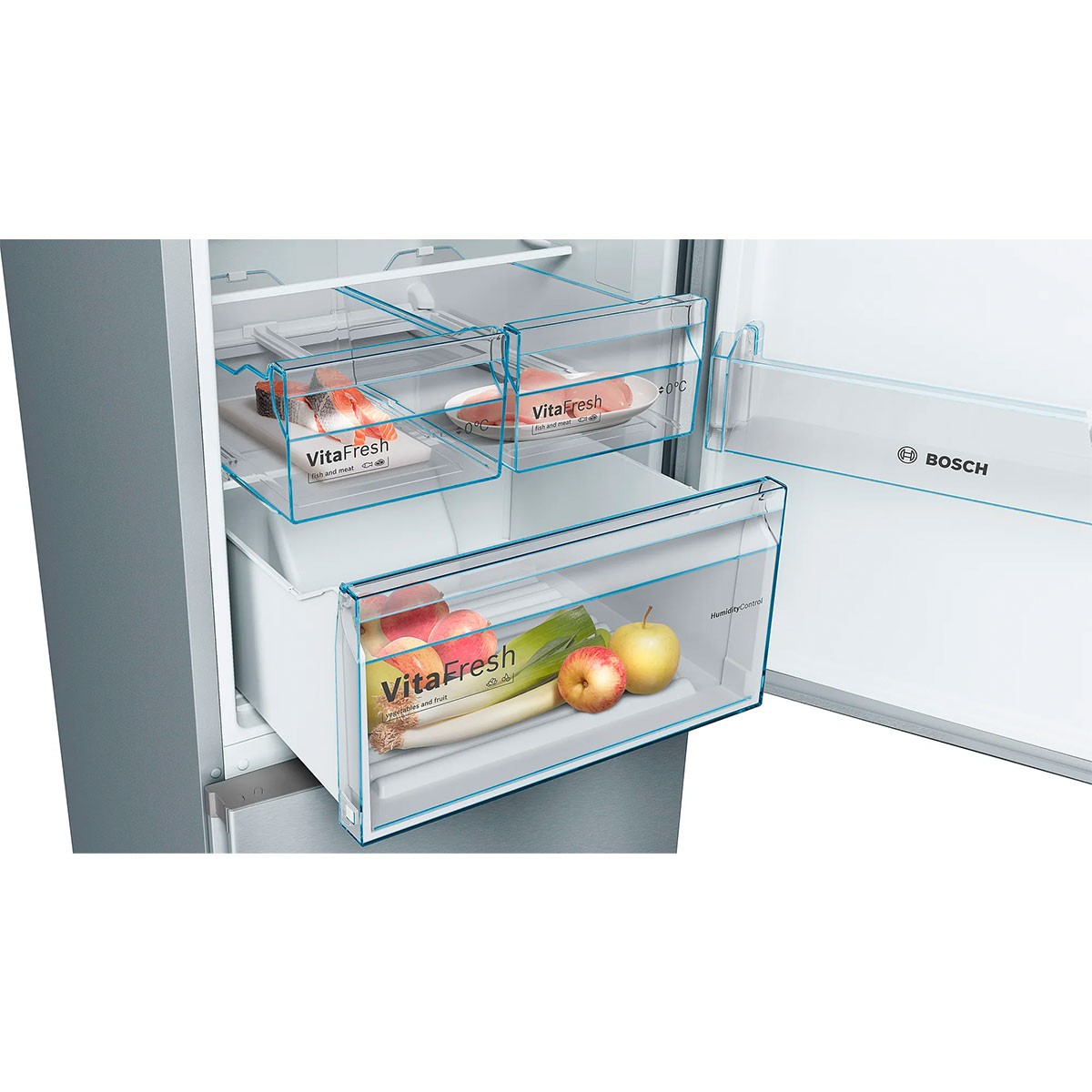 Interior de refrigerador con cajones de verduras, frutas y la etiqueta VitaFresh.
