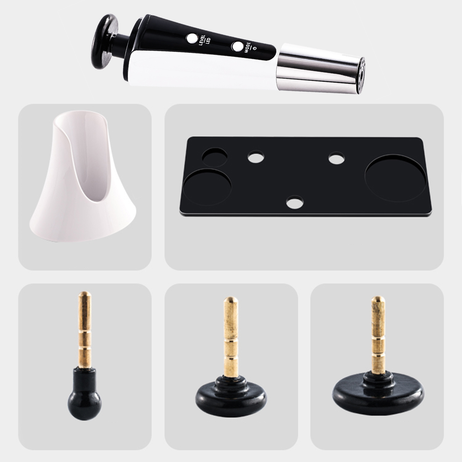 Dispositivo médico con piezas. Incluye un soporte y varios accesorios con detalles en oro y negro.