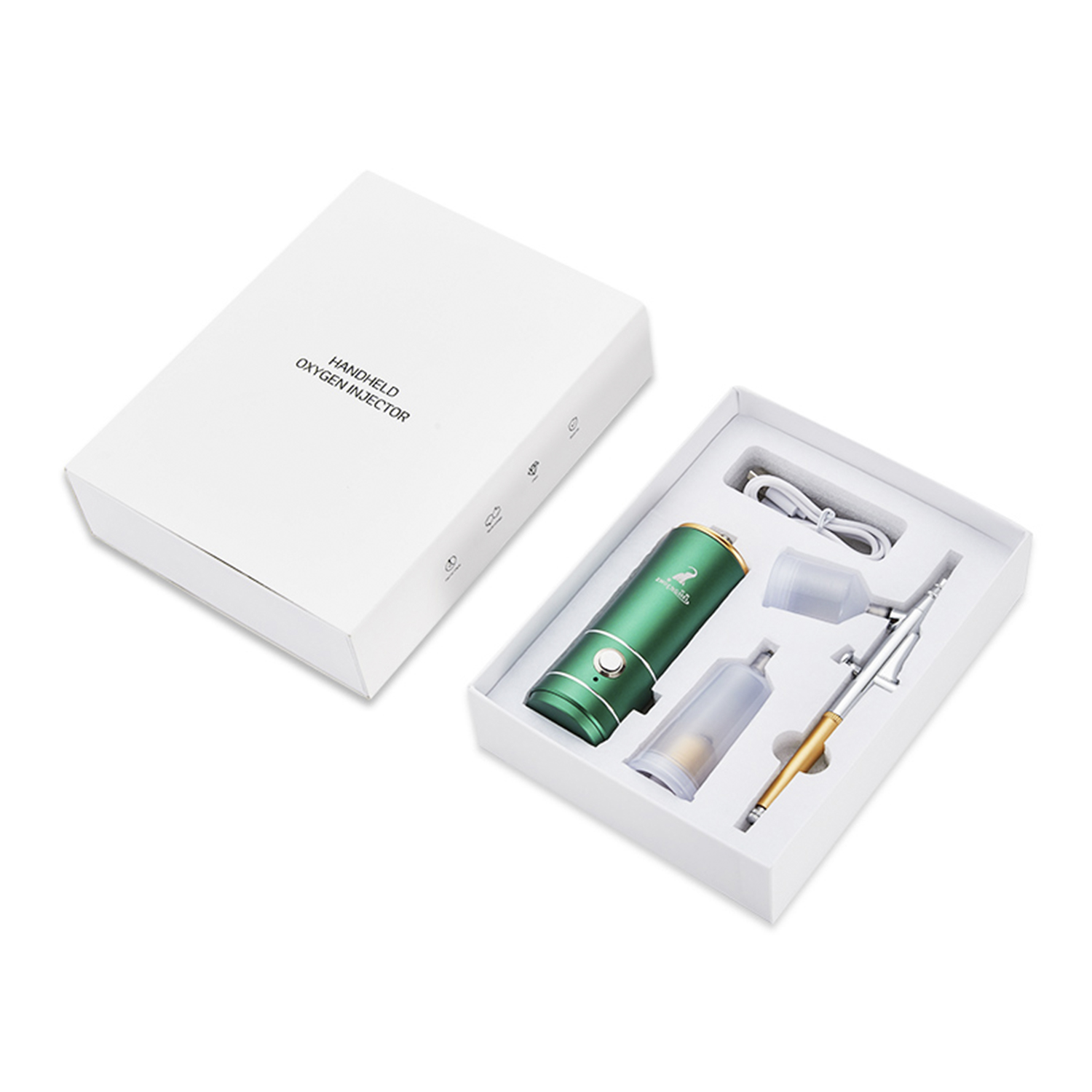 Kit de inyector de oxígeno portátil. Dispositivo verde, caja blanca. Accesorios en la caja. Fondo blanco.
