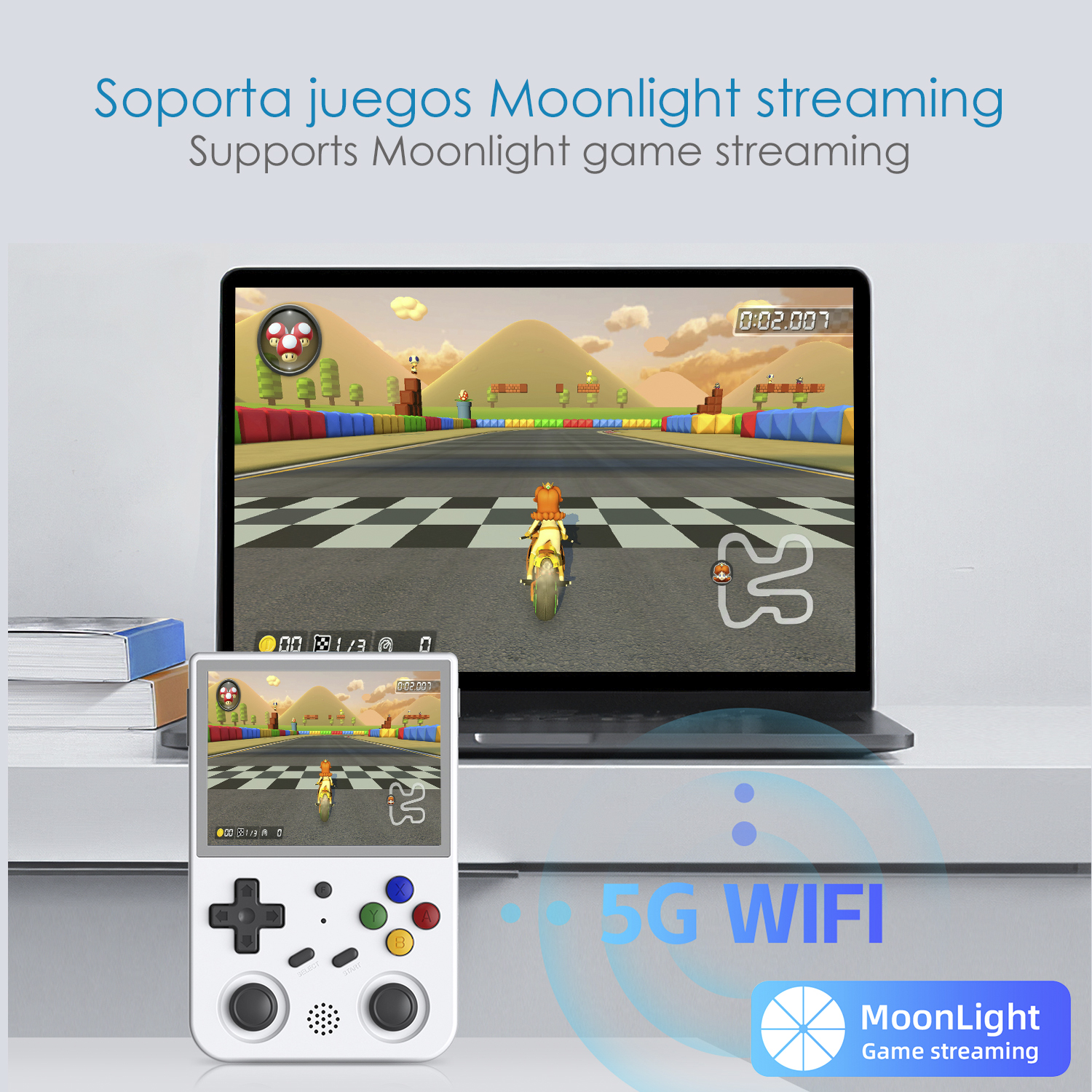 Un laptop che mostra un gioco di corse. Una console di gioco portatile è sotto lo schermo.