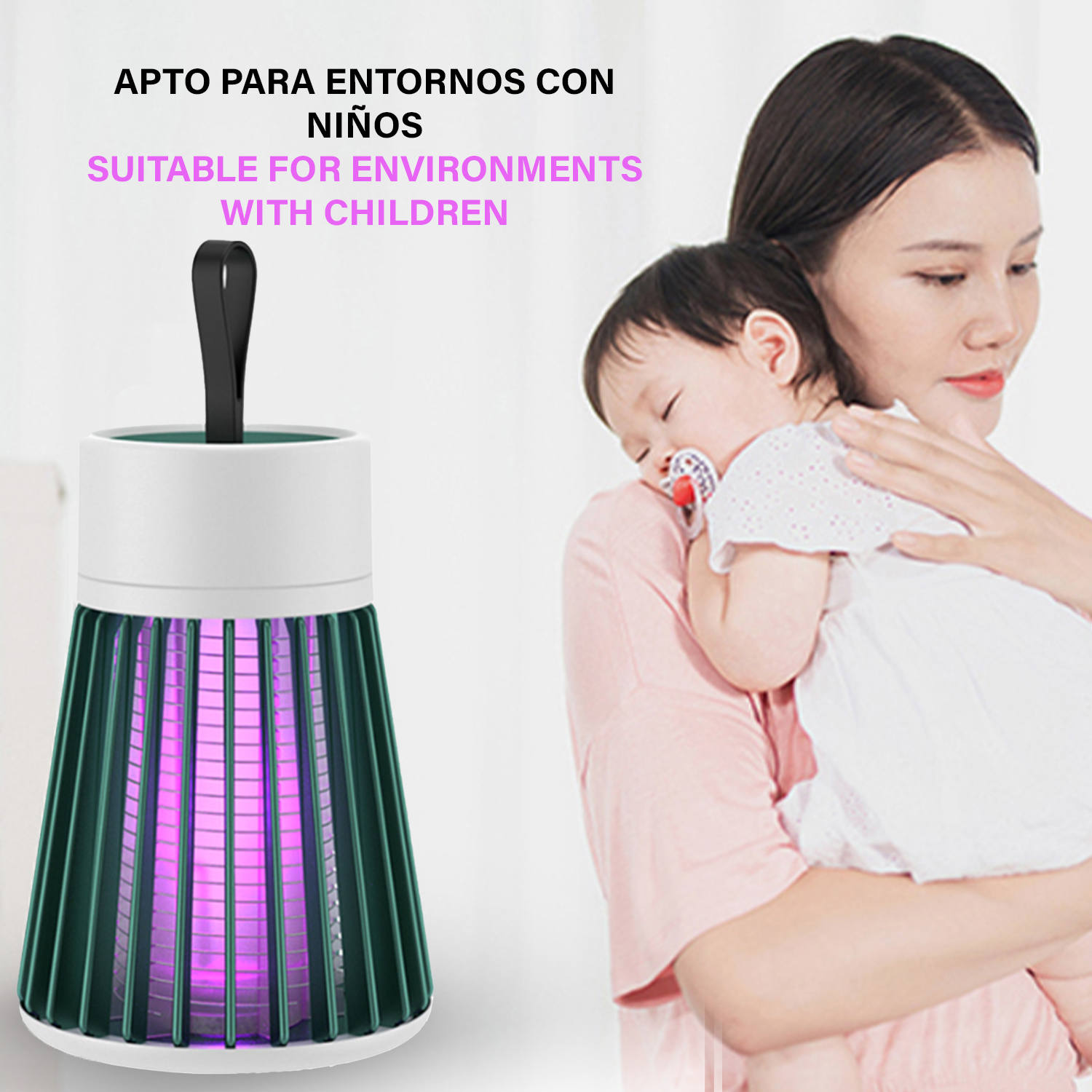 Una mujer sosteniendo un bebé junto a una trampa para mosquitos.