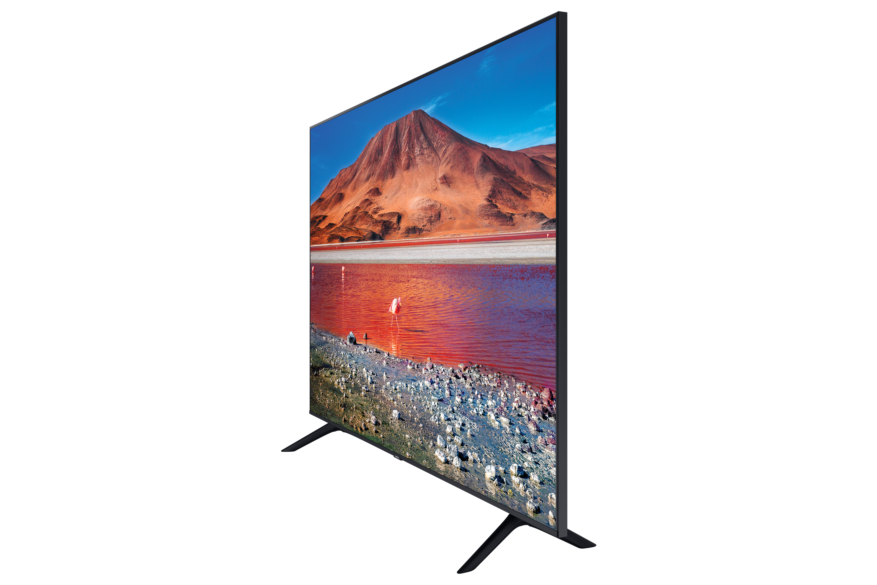 TV a schermo piatto largo che mostra un paesaggio con montagne, acqua e aree rosa.