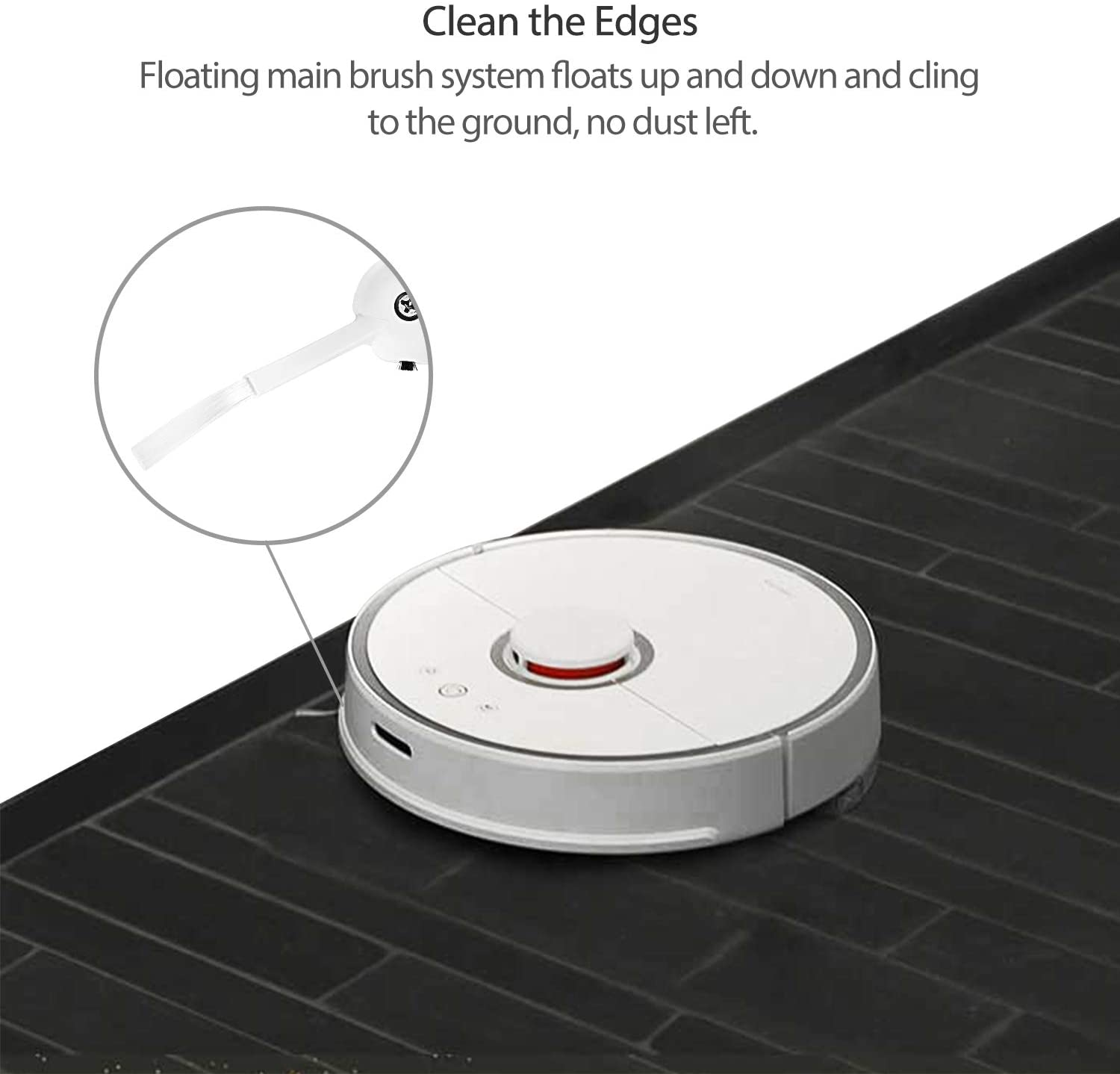 Biały robot odkurzający na czarnej podłodze z płytek z okrągłym detalem.