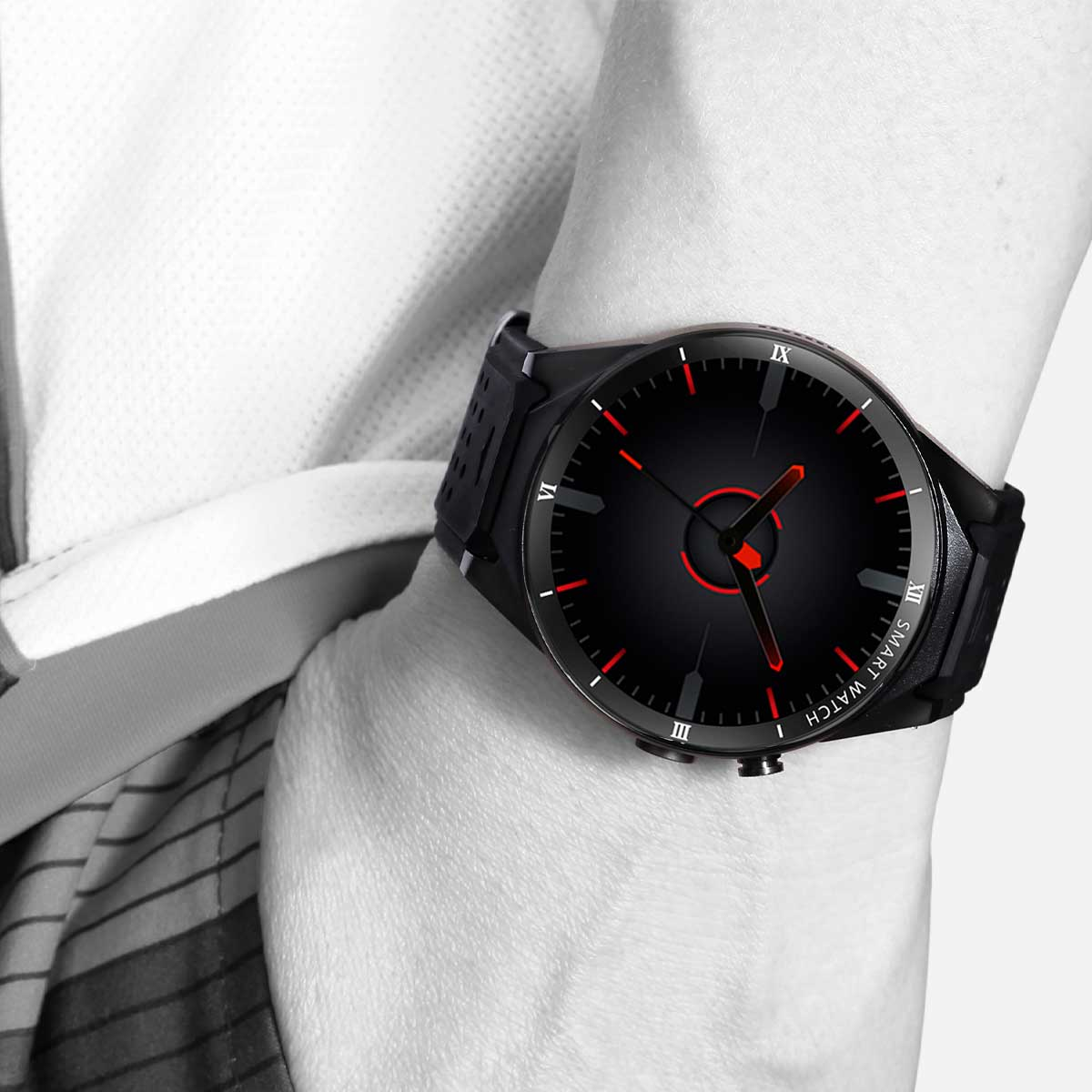 Smartwatch nera al polso, quadrante nero e dettagli rossi.