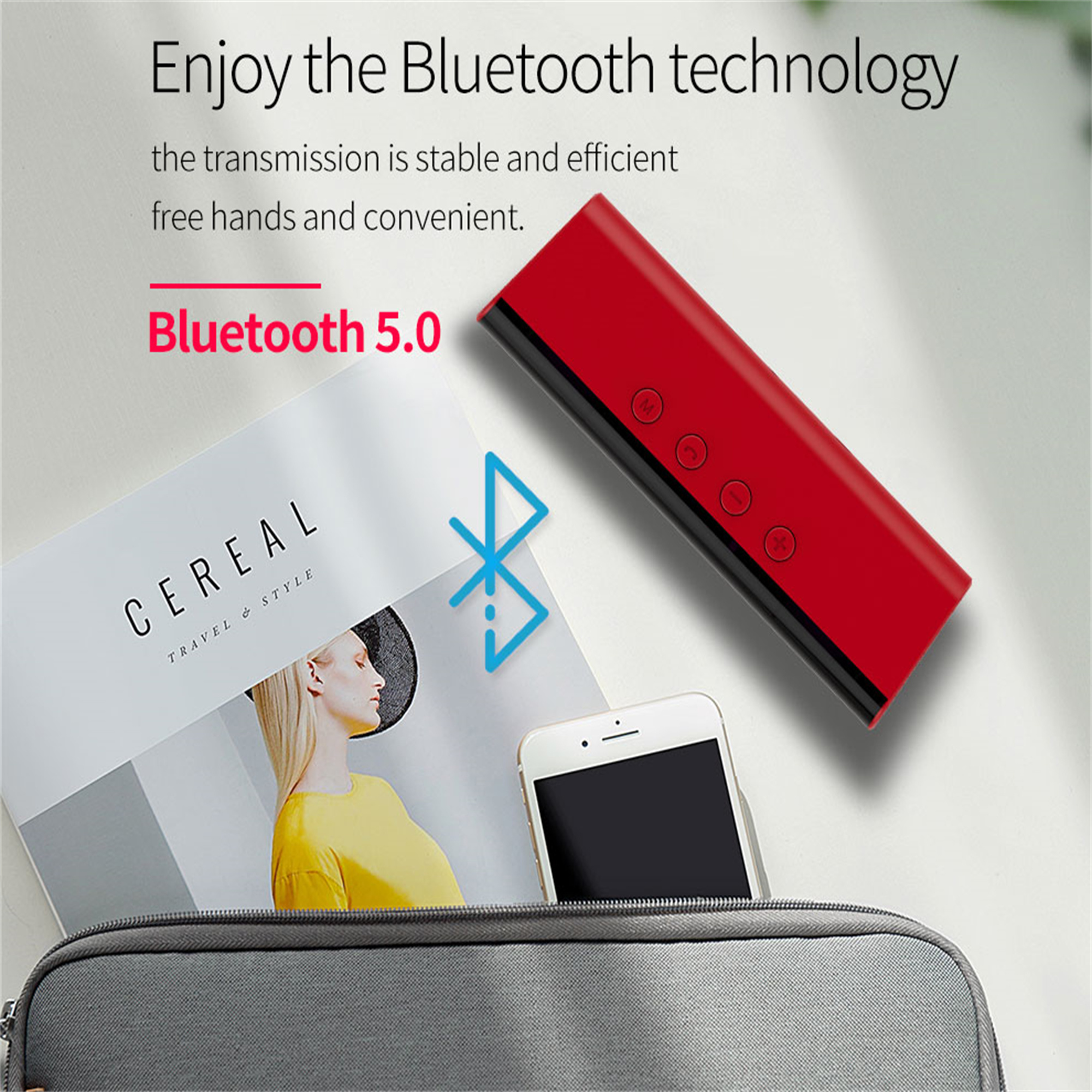 Ein roter Bluetooth-Lautsprecher mit schwarzer Oberseite, ein weißes Telefon und eine Zeitschrift. Der Text sagt Bluetooth 5.0.