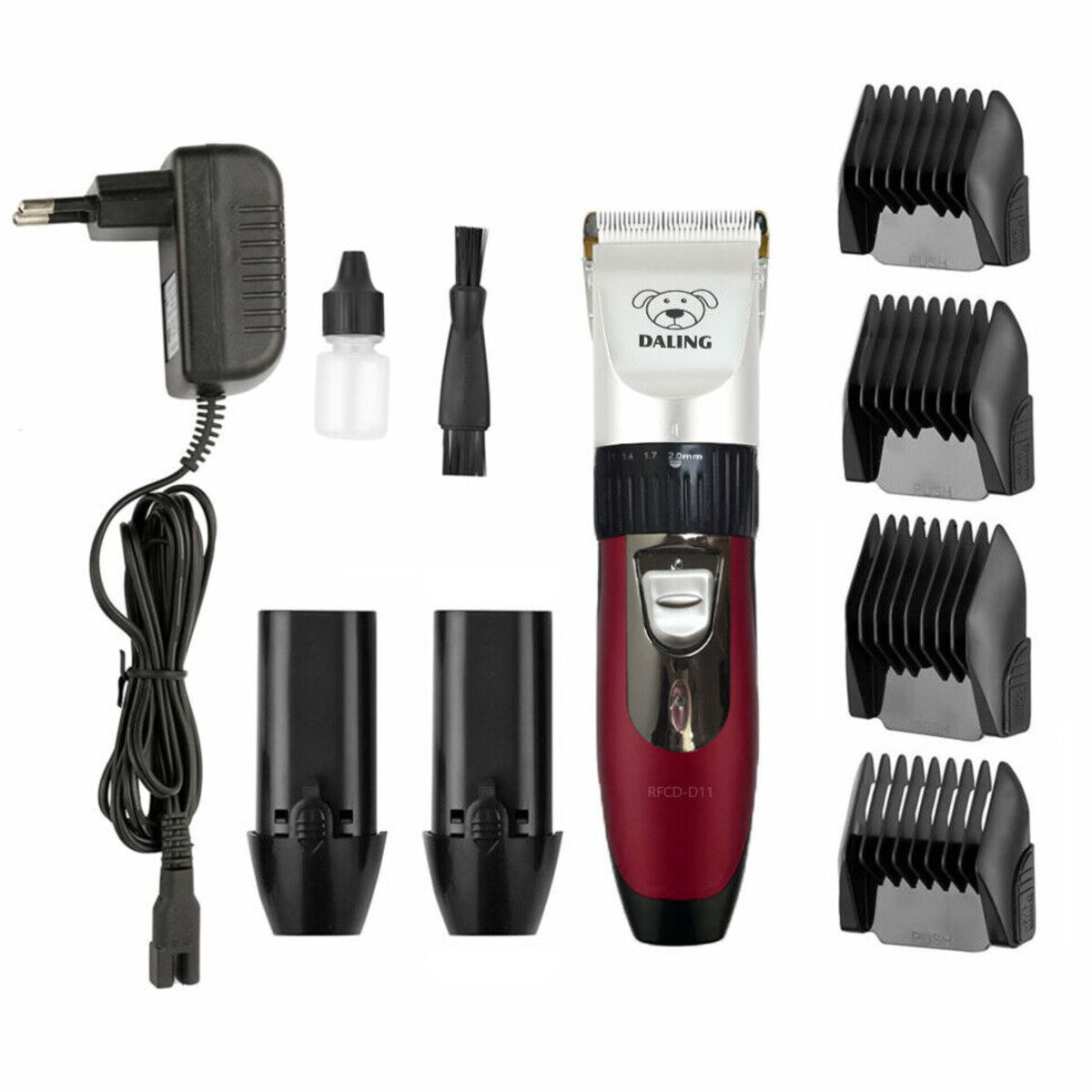 Ein Set von Hundefriseurwerkzeugen: Schermaschine, Klingen, Öl, Bürste, Ladegerät und zwei Batterien.