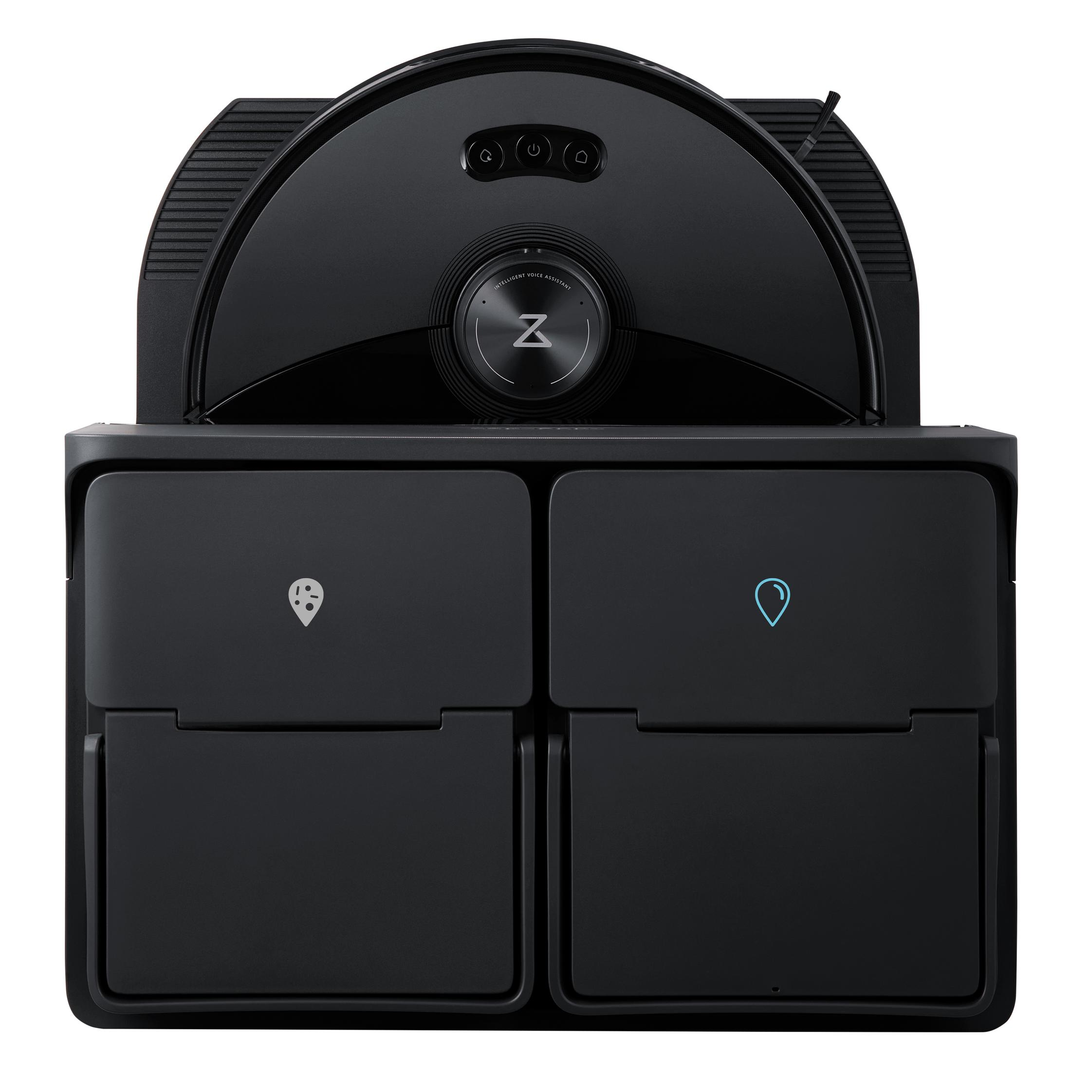 Czarny robot sprzątający na czarnej stacji ładującej, widok z przodu. Widoczne dwa pojemniki.