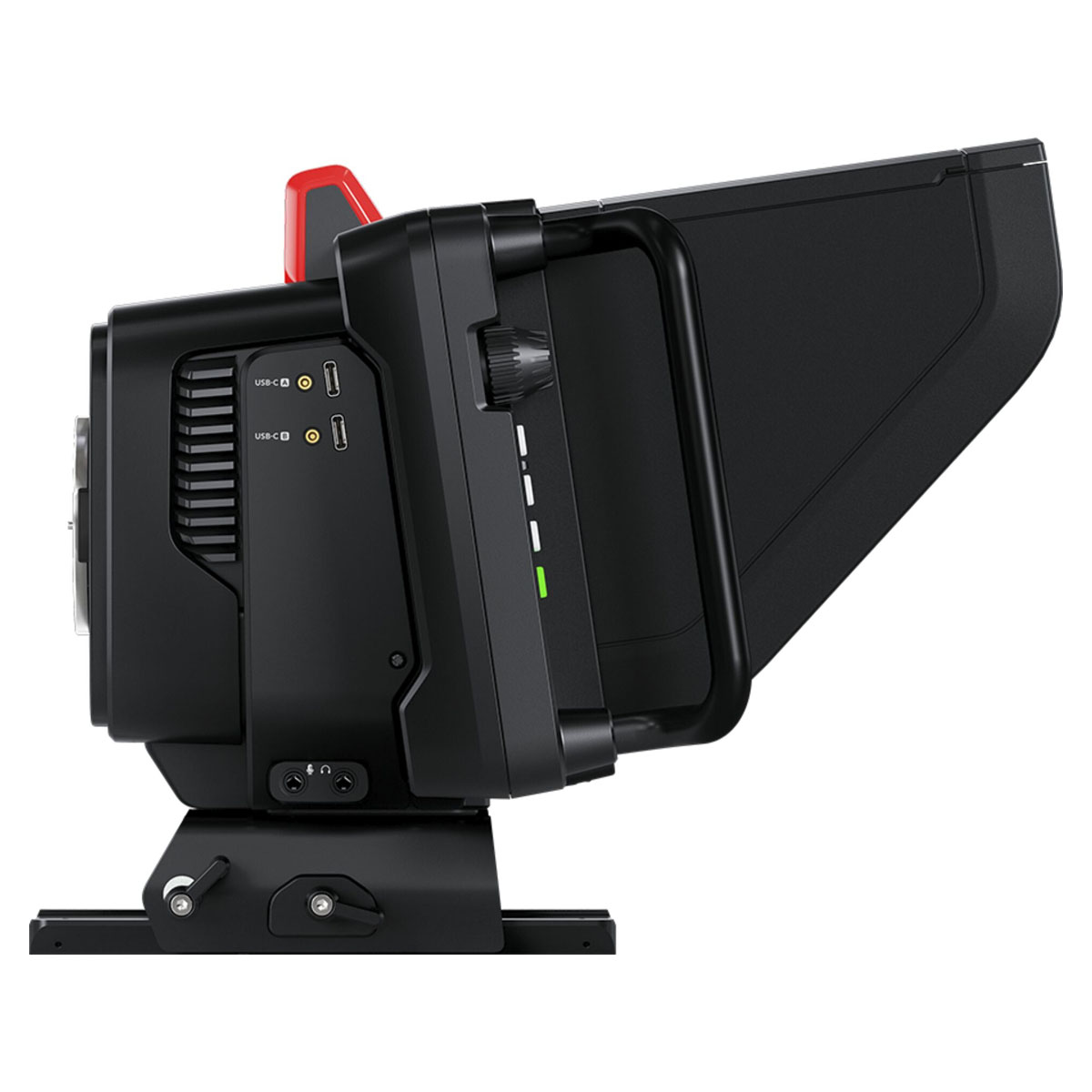 Czarny aparat z czerwoną górą, pod kątem, pokazujący porty i uchwyt.