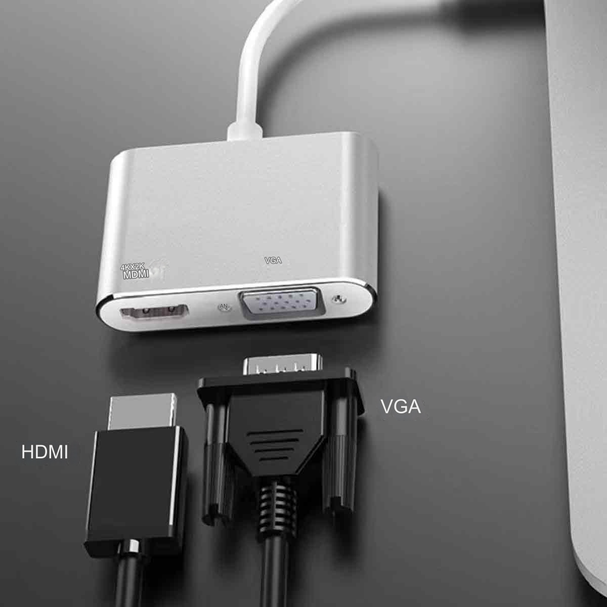 Ein HDMI-zu-VGA-Adapter. Das HDMI-Kabel ist schwarz, das VGA-Kabel ist schwarz und blau.