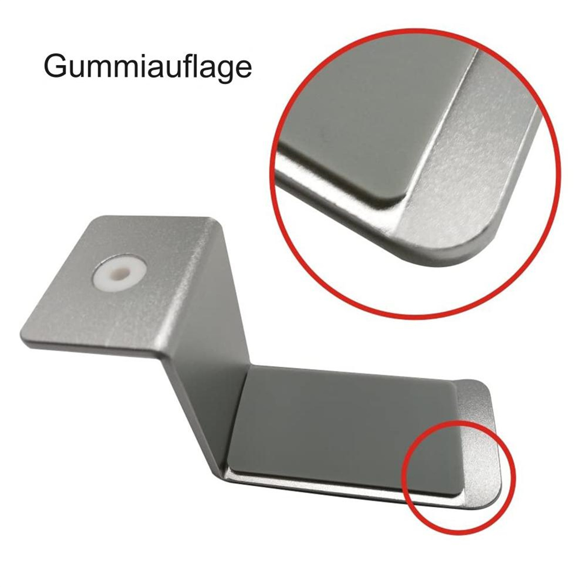 Ein silbernes Metallteil, mit Nahaufnahme, und ein roter Kreis um eine Ecke.