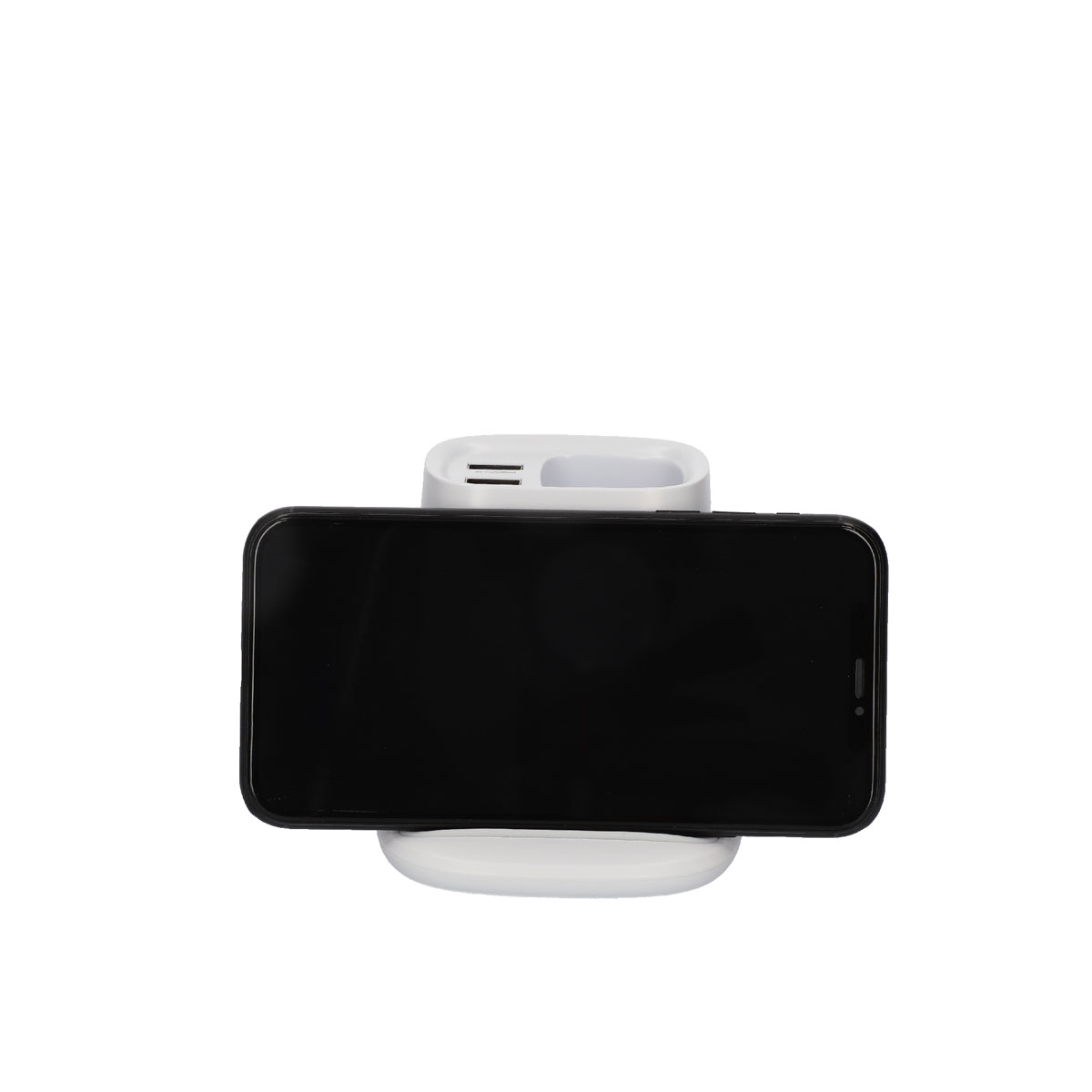 Un teléfono inteligente negro sobre un soporte de carga blanco, fondo blanco.