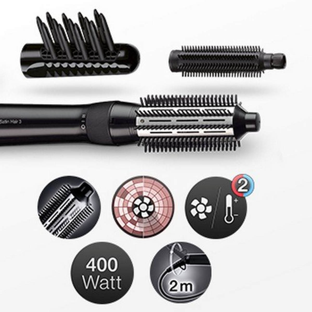 Arricciacapelli con accessori. Ha un manico nero e molteplici accessori per acconciare i capelli. Vengono mostrati vari accessori.