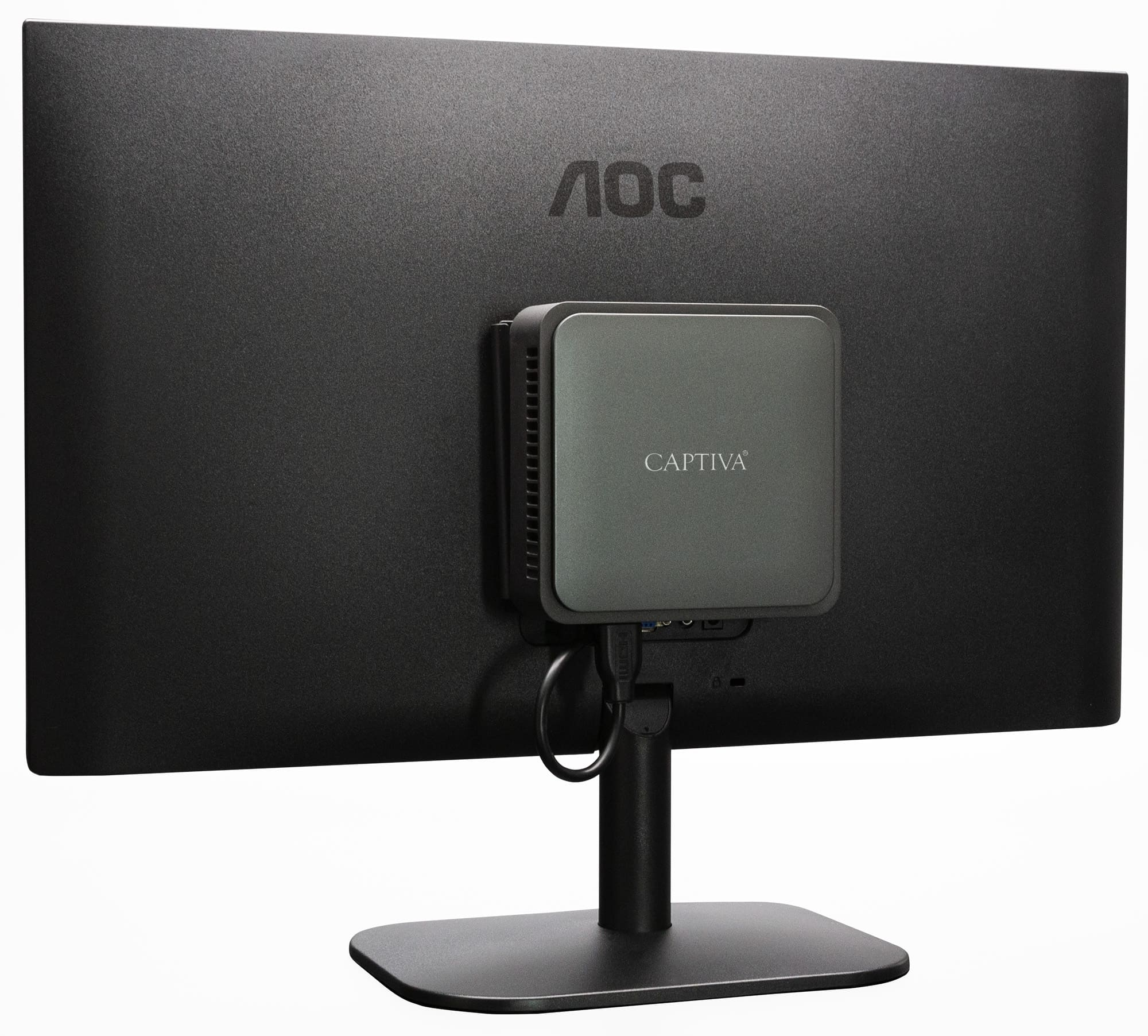 Tył czarnego monitora AOC z dołączonym srebrnym mini PC Captiva. Podtrzymuje go czarny stojak.