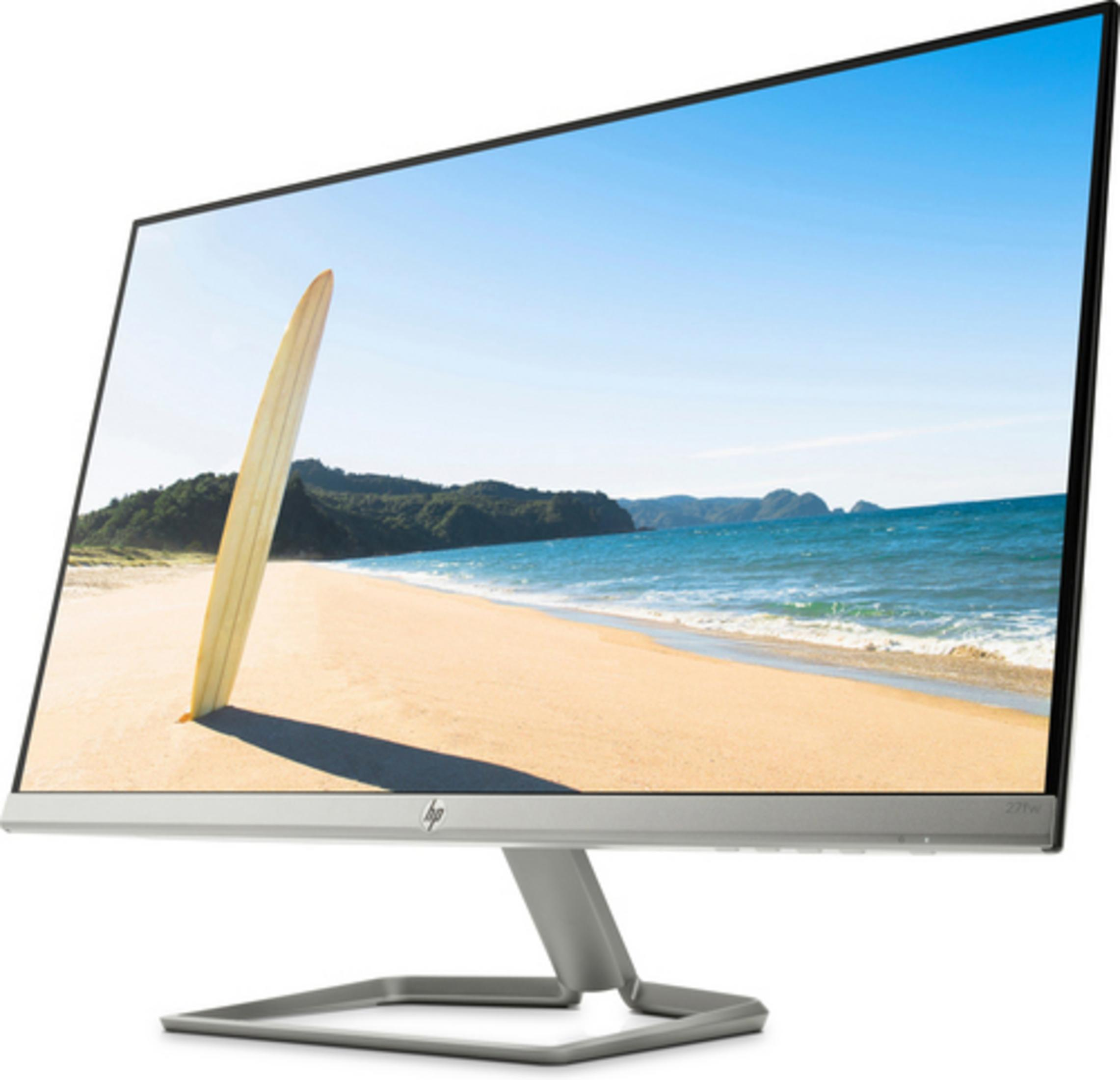 Un monitor mostra una scena di spiaggia con una tavola da surf. Il monitor è su un supporto argentato.