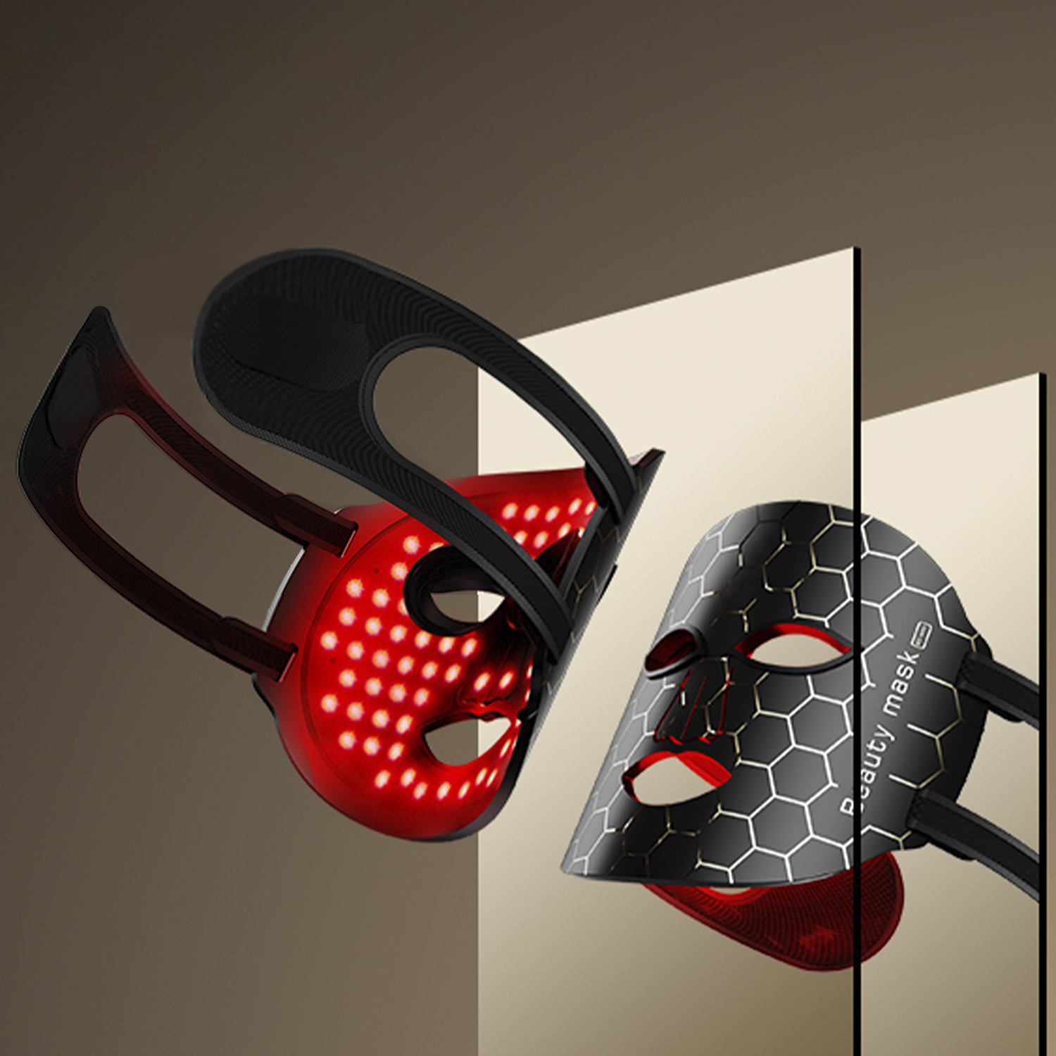 Se muestran dos mascarillas rojas y negras, una iluminada.
