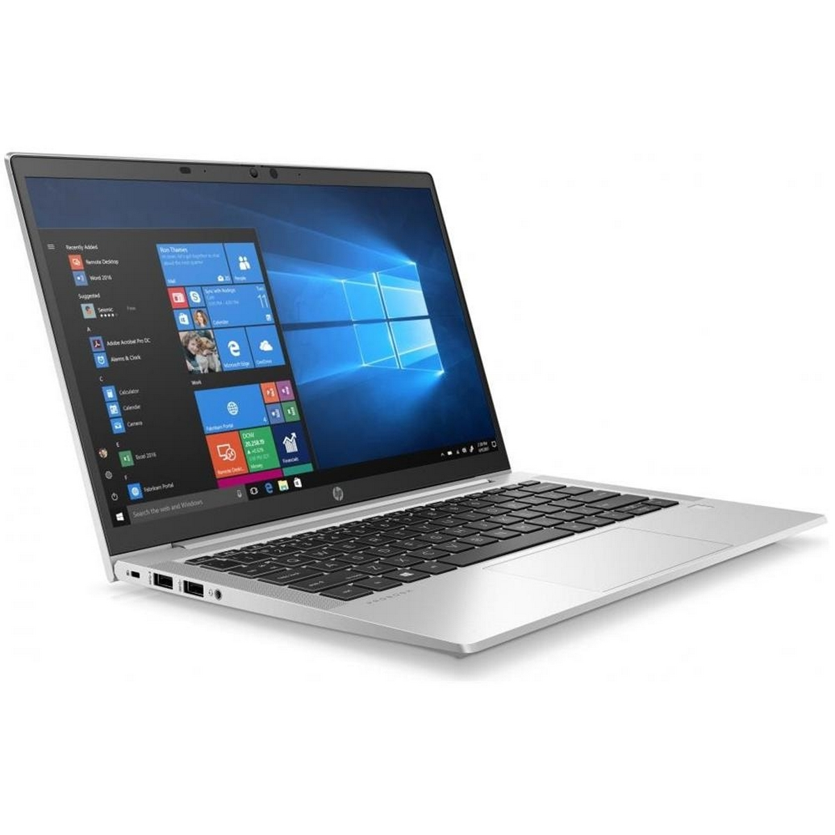 Laptop argentato su superficie bianca, aperto, con schermo Windows e tastiera.