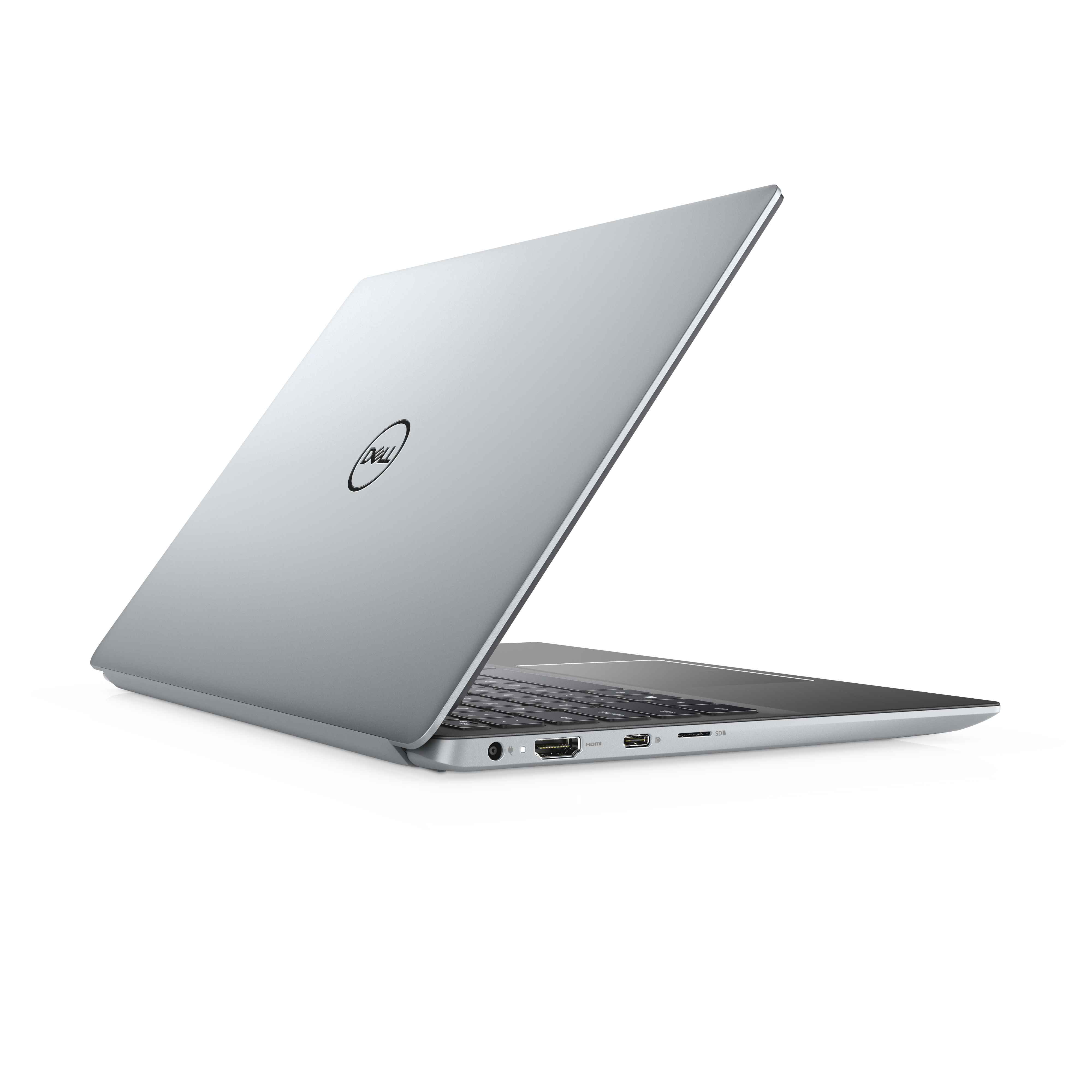 Laptop Dell argento su superficie bianca, aperto ad angolo, mostra il retro.