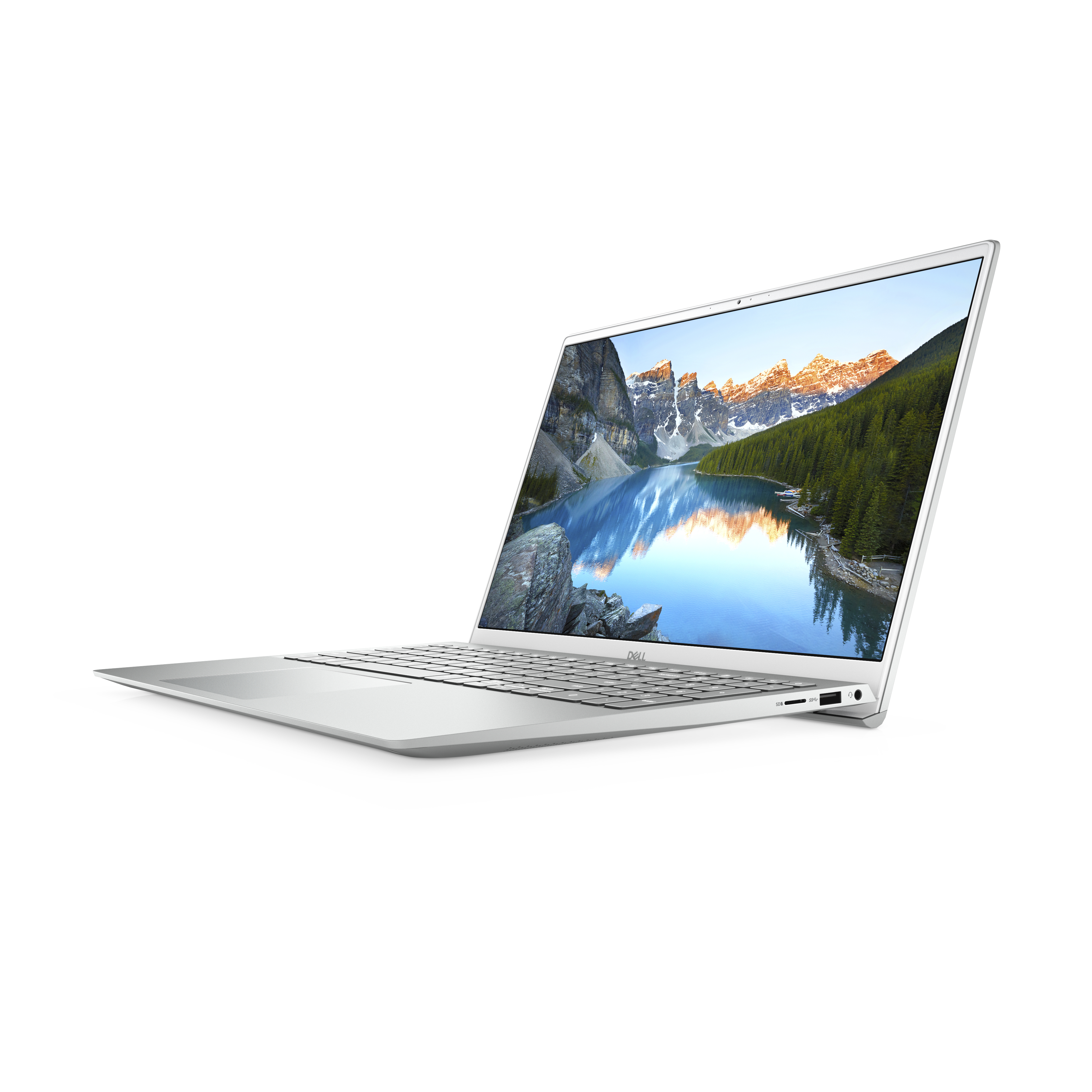 Laptop argentato, aperto, inclinato a sinistra, su una superficie bianca. Sfondo montagna e lago.
