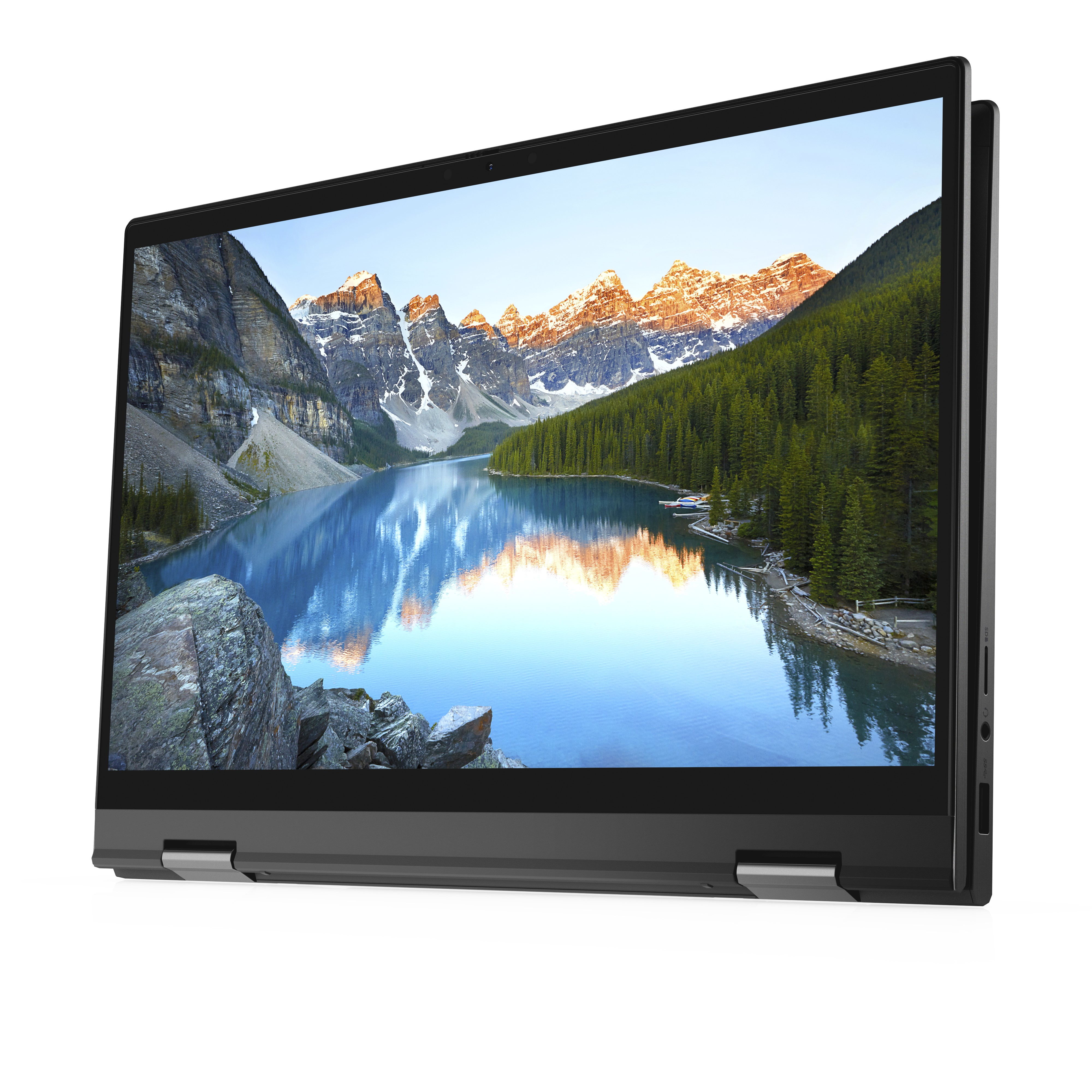 Un laptop Dell nero aperto su una superficie bianca, che mostra un lago con montagne sullo sfondo.