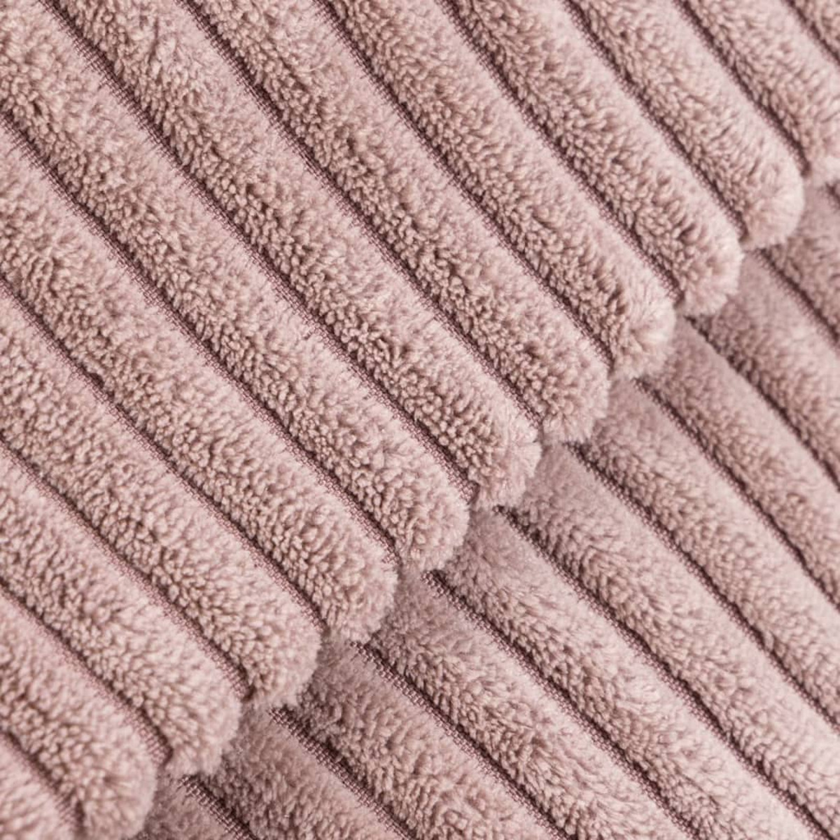 Nahaufnahme von rosa Cordstoff.