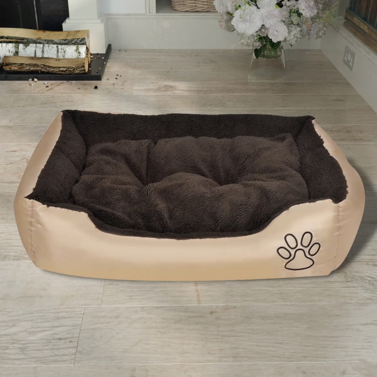 Ein Haustierbett, beige mit einem braunen, flauschigen Kissen und einem Pfotenabdruck.